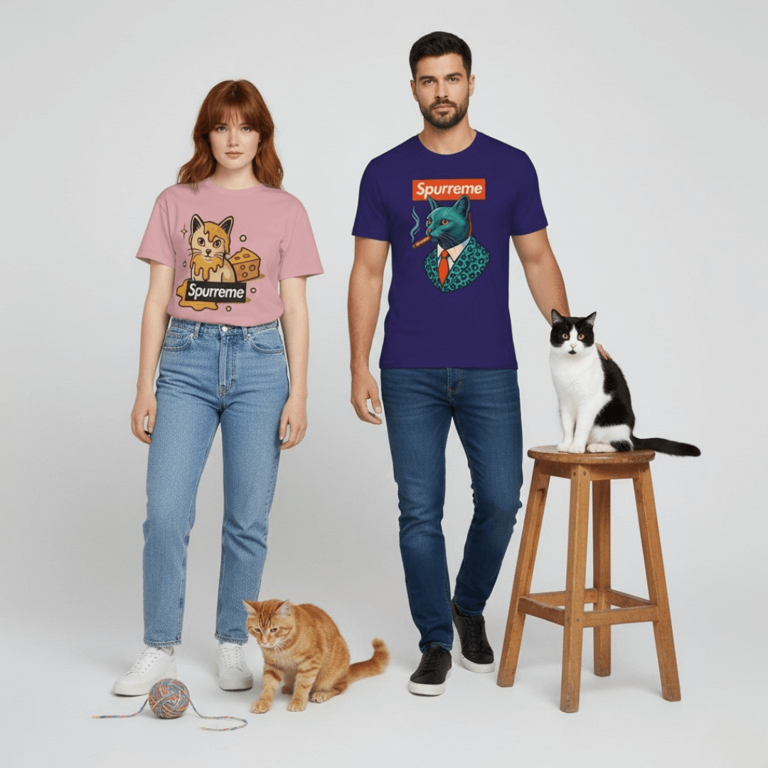 Funny adult t shirts — man and woman wearing Spurreme cat graphic tees in studio with two cats; funny t shirts for men and women
