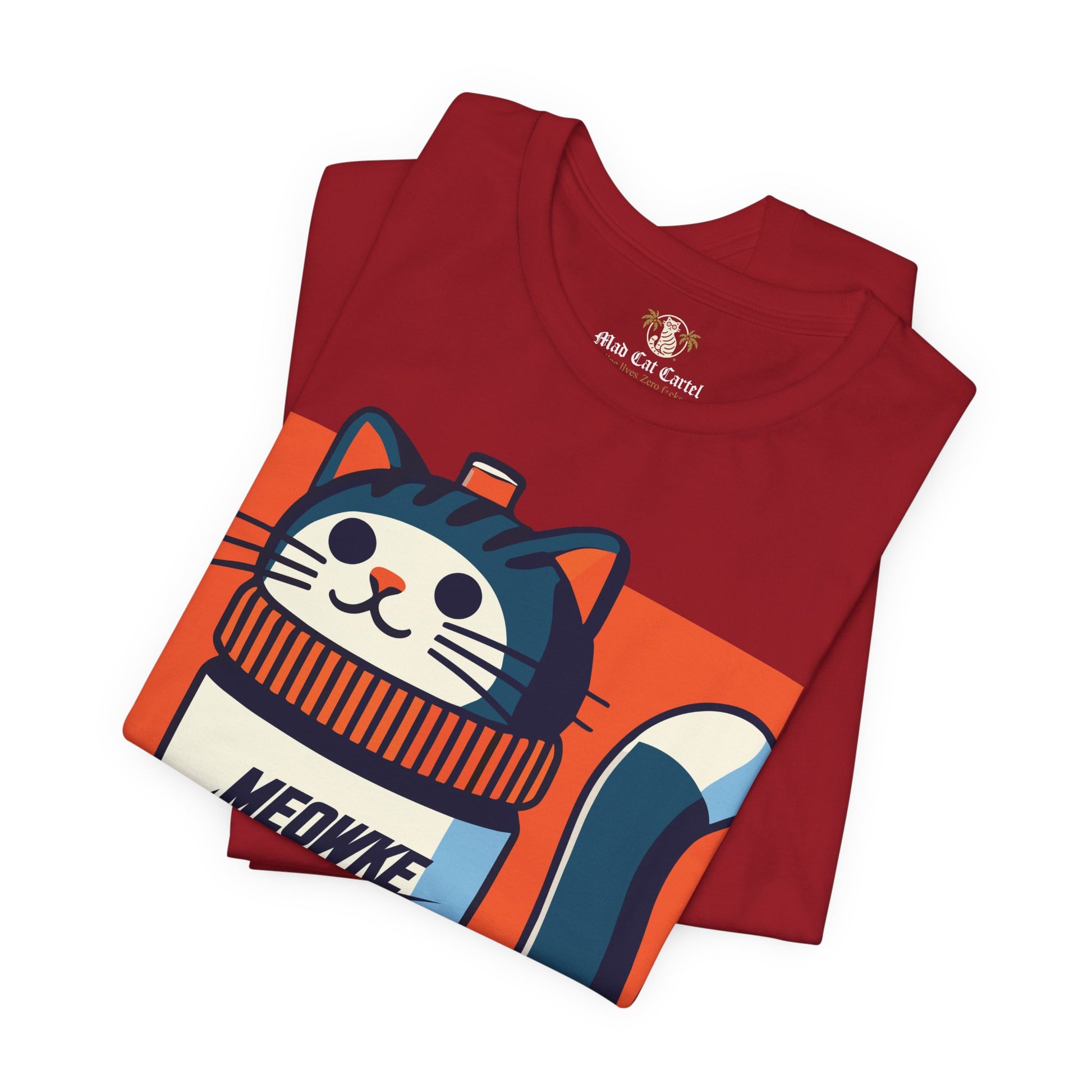 Funny cat shirt for men – canvas red unisex tee, folded front view, Meowke Swoosh cartoon cat graphic