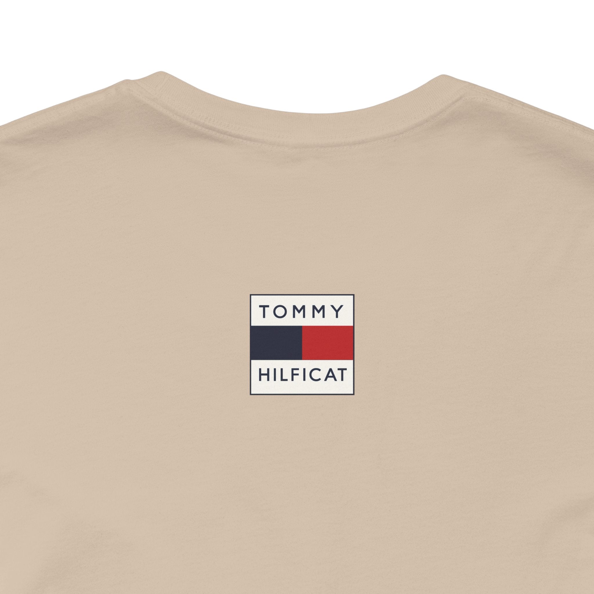 Tan cat themed clothing back label close up