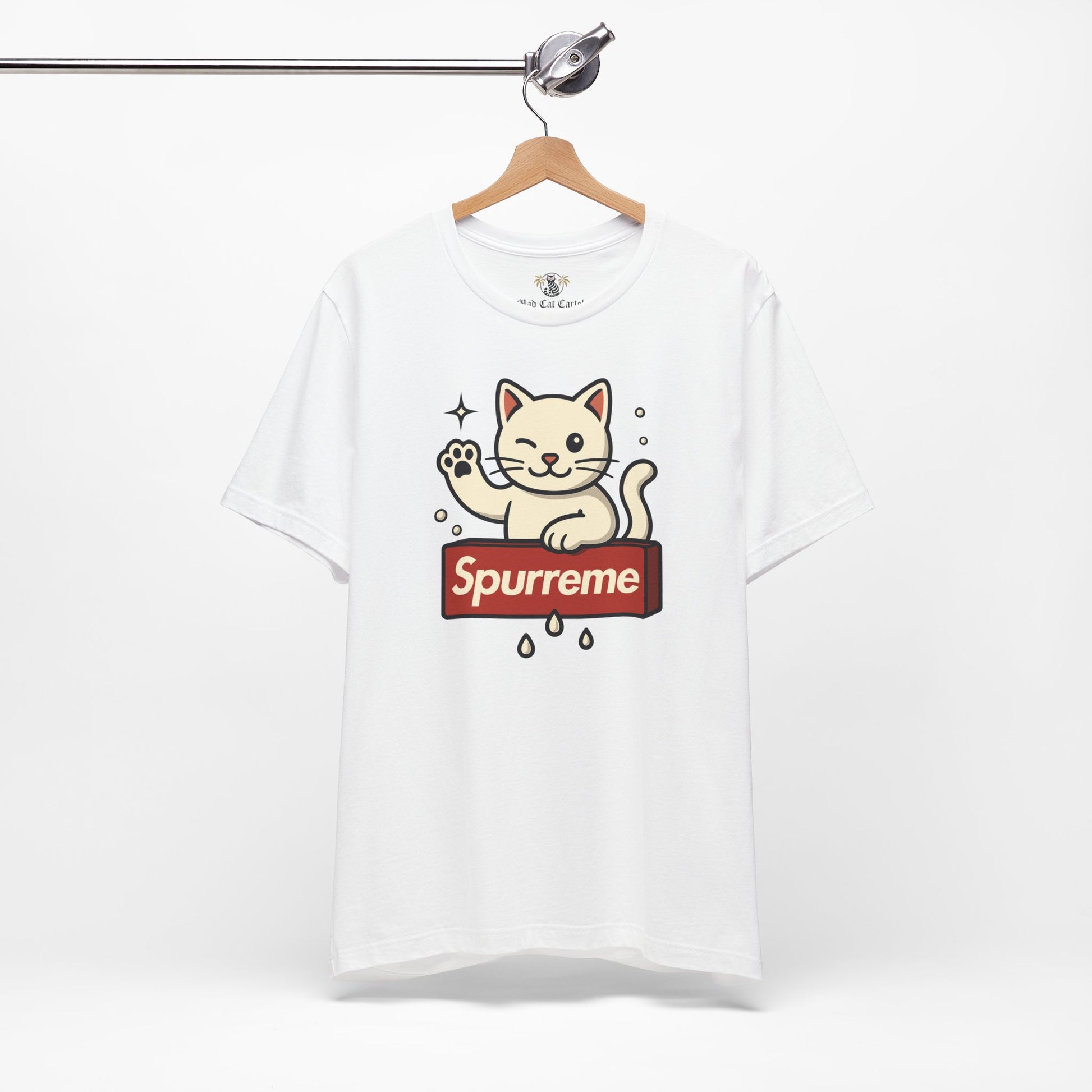 White t shirt hanging on wooden hanger cat themed clothing