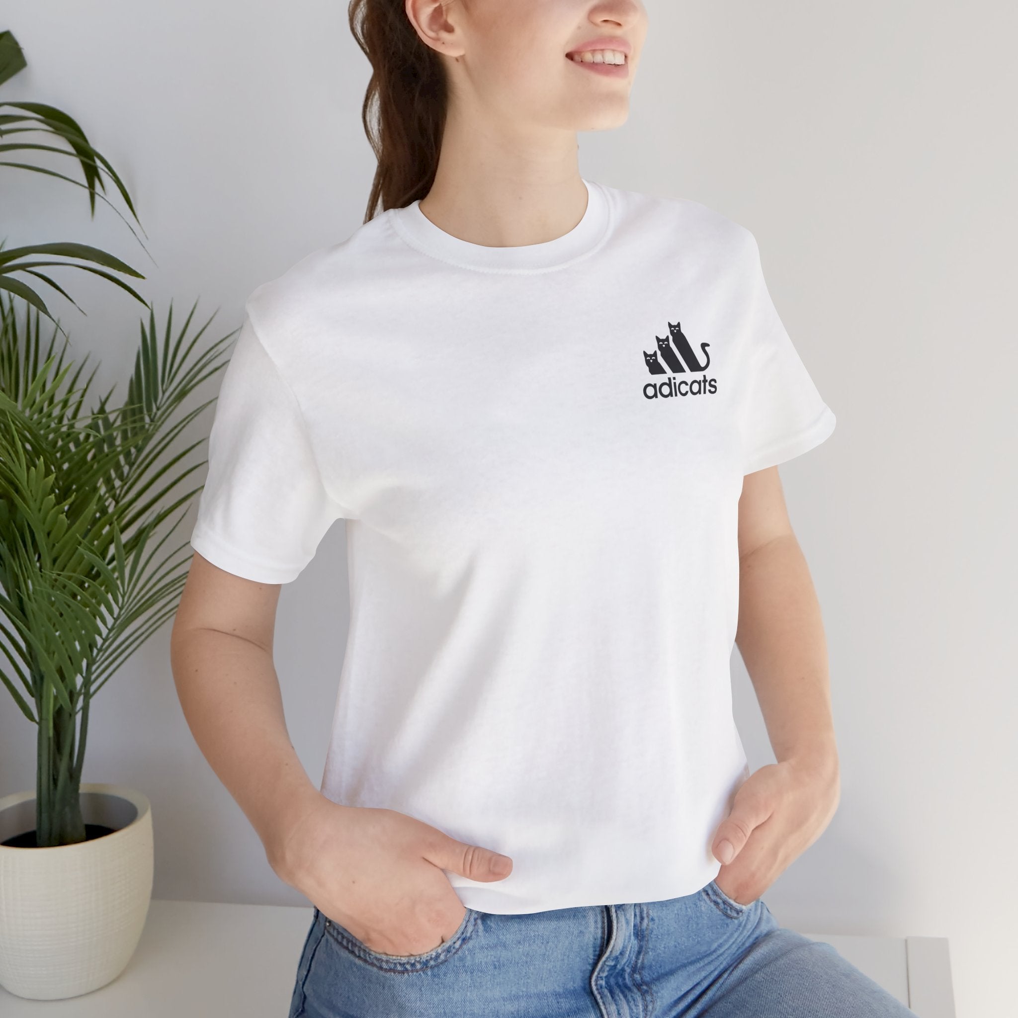 Adicats Signature Logo Parody T-Shirt in white, worn by a female model