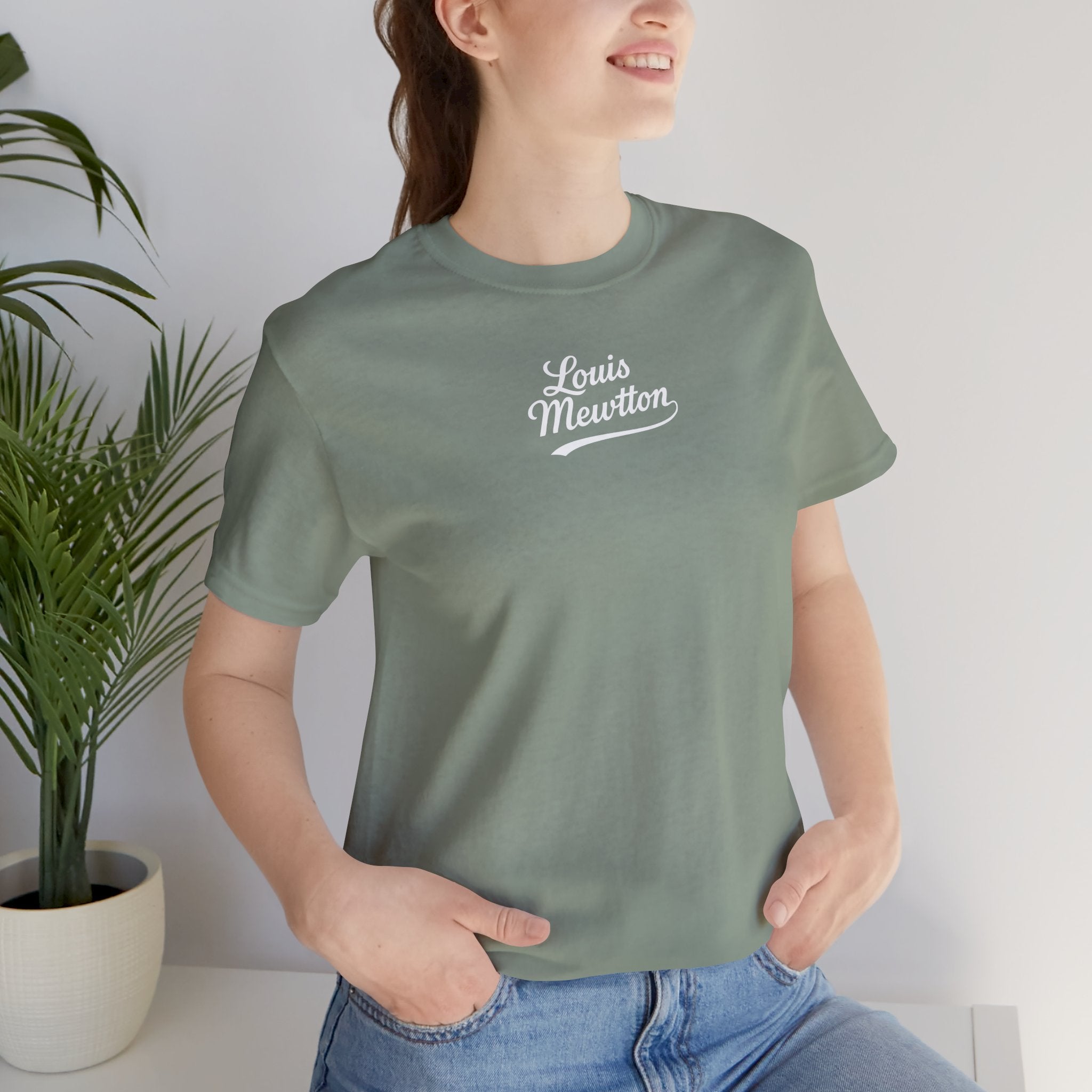 Louis Mewtton Chief Executive Cat Graphic T-Shirt in sage, worn by a female model
