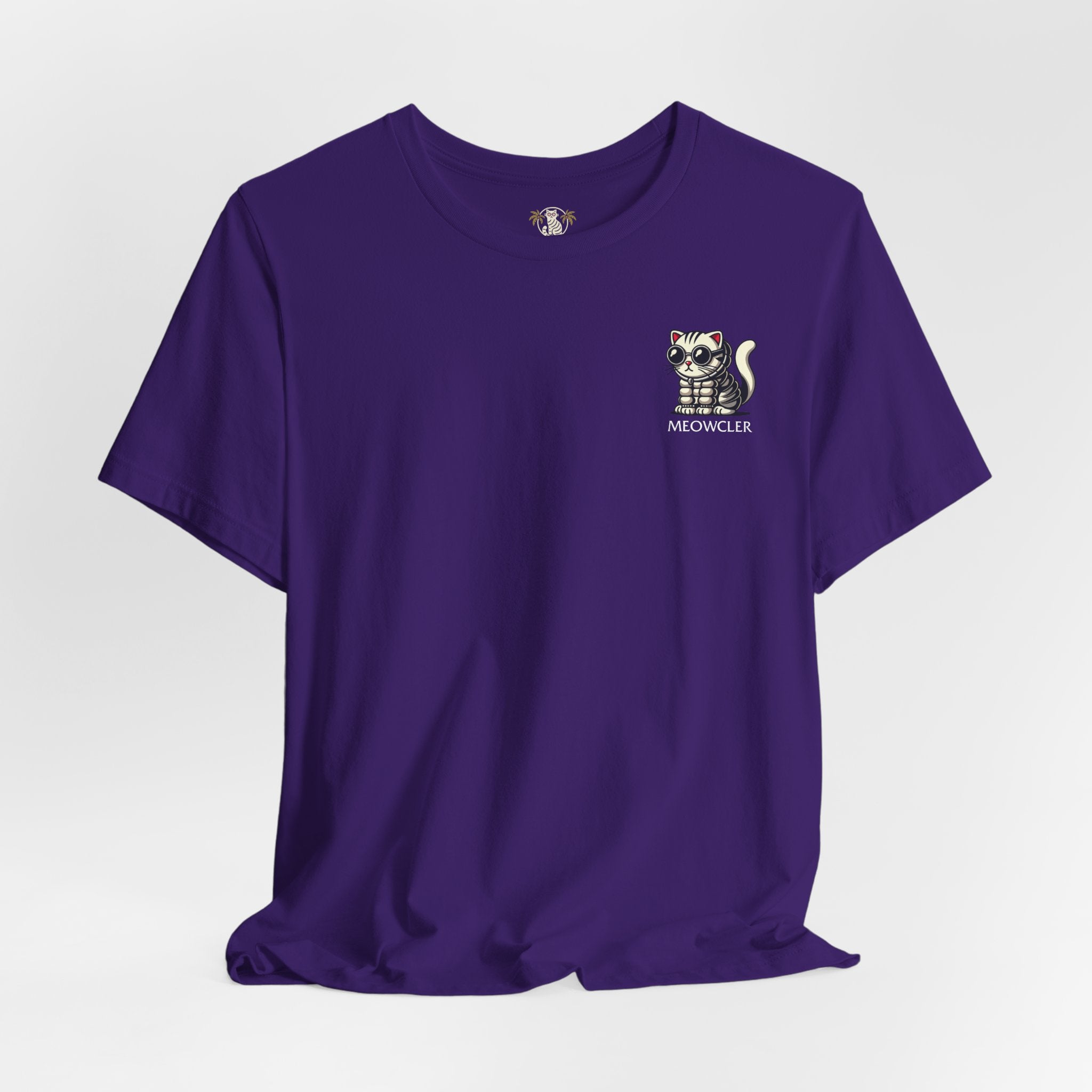 Meowcler Mini Puff Chest Graphic Cat T-Shirt in team purple, flat lay