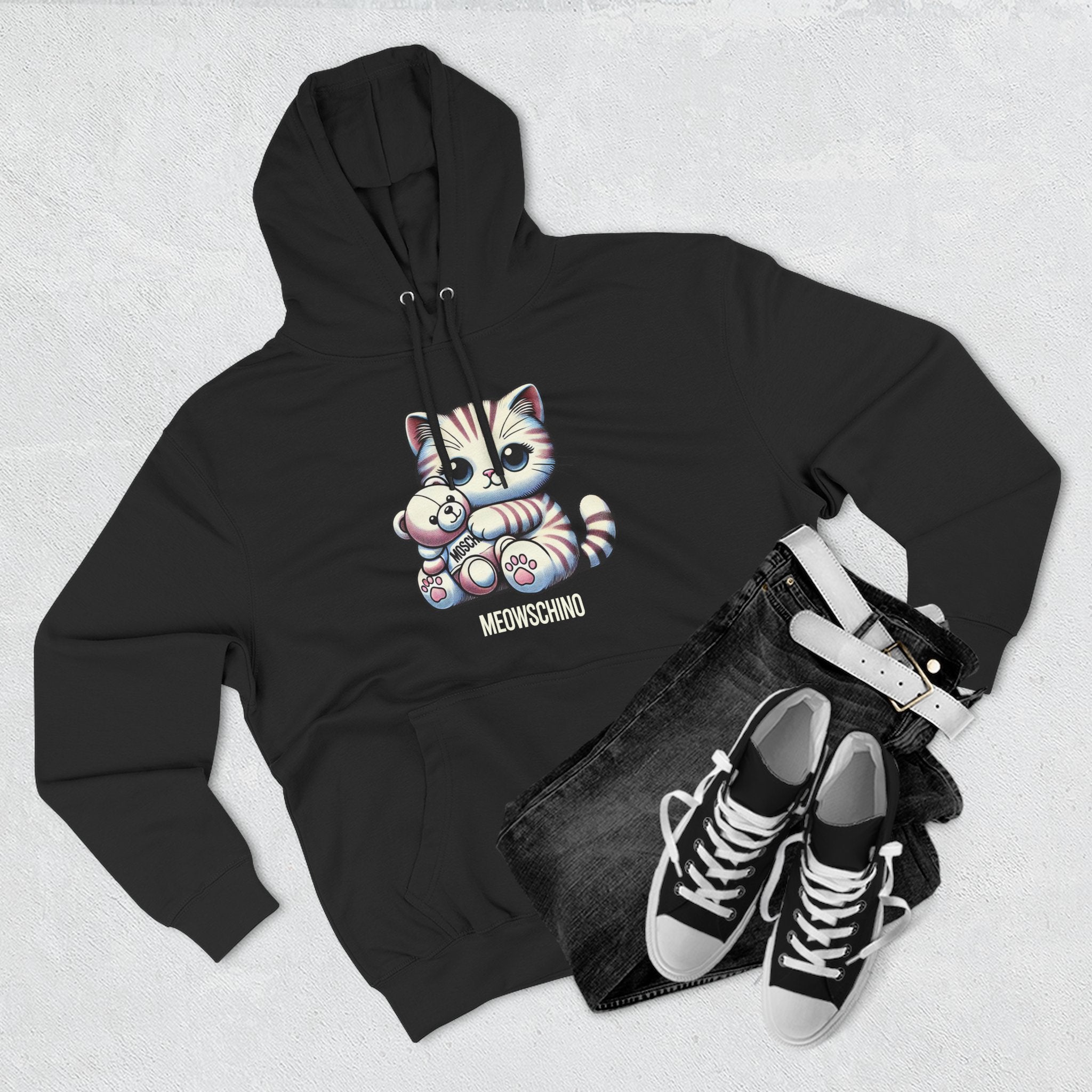 Meowschino Teddy Hug Cat Graphic Hoodie in black, flat lay