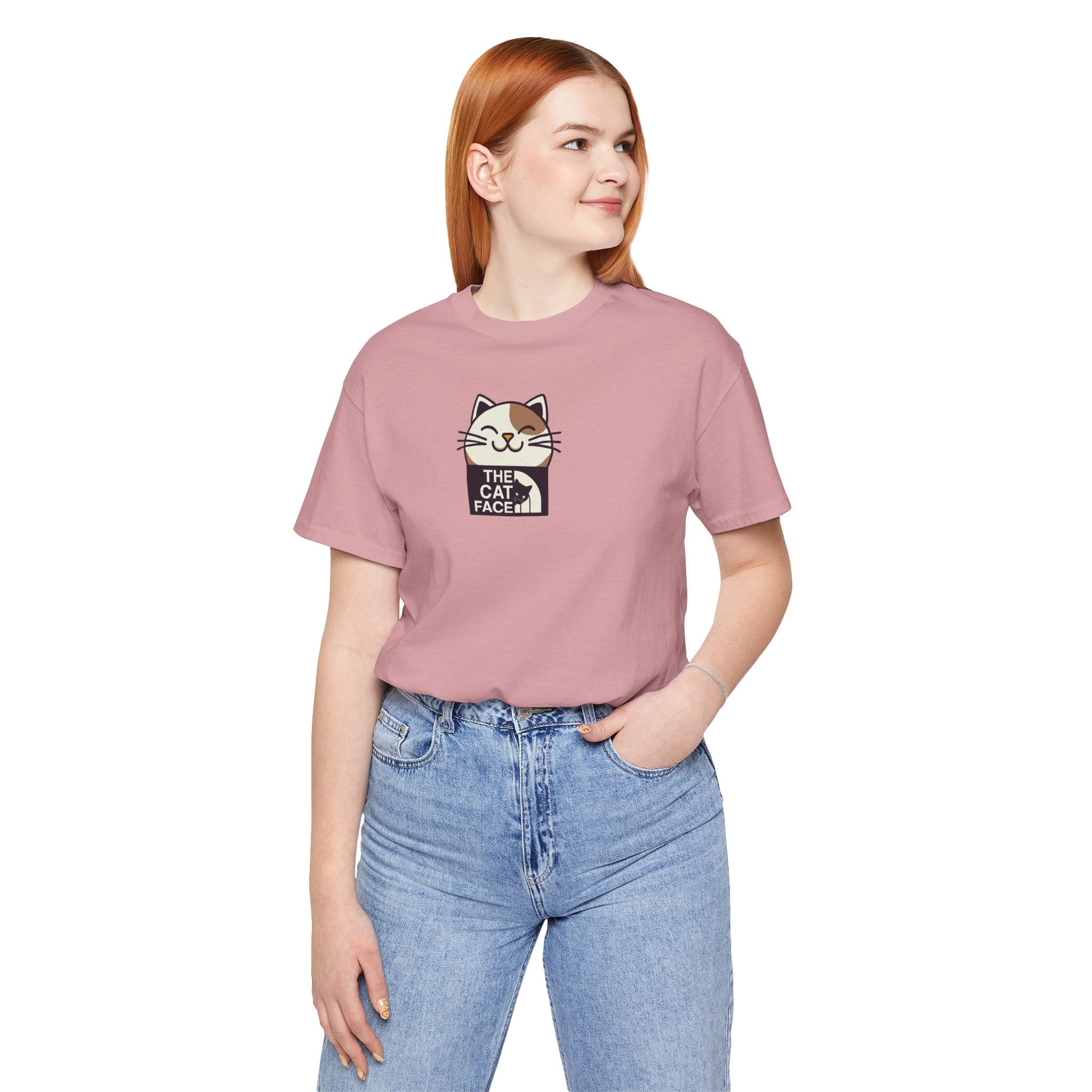 The Cat Face Winking Cat Logo Graphic T-Shirt in orchid, worn by a female model