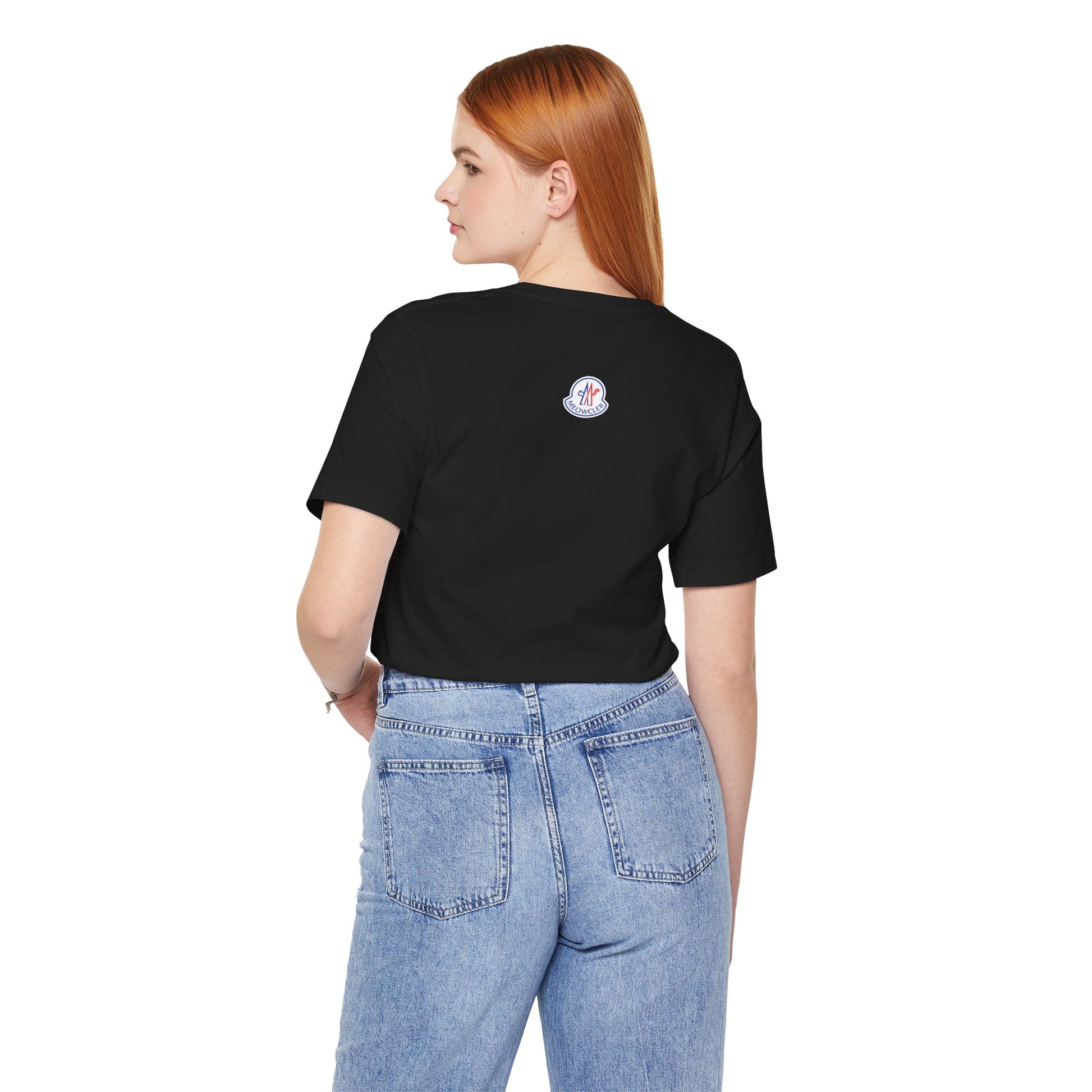 Female model back view showing Meowcler logo on black cat tee