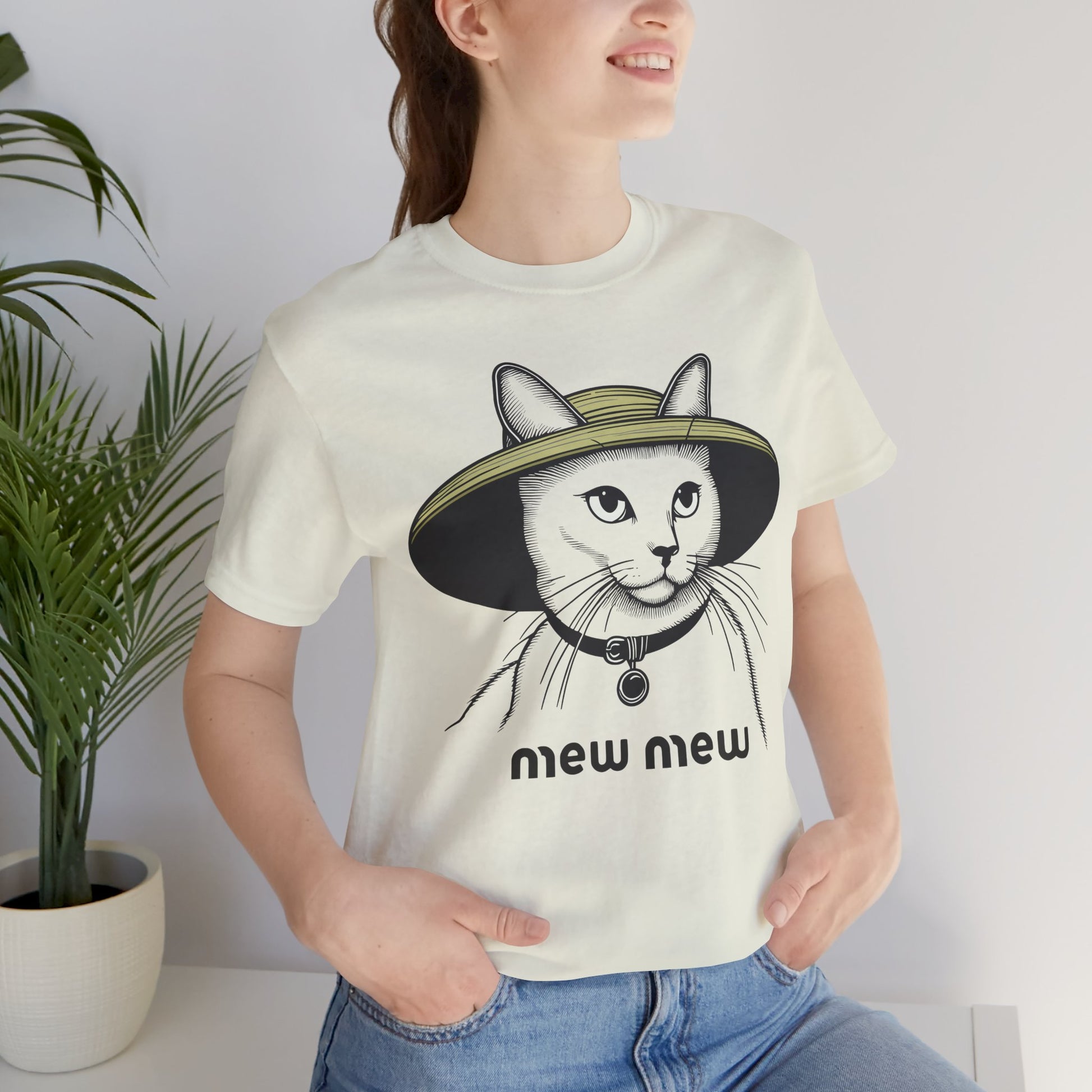 Cat graphic t shirt – citron unisex tee worn by female model, Mew Mew cat in wide-brim hat print