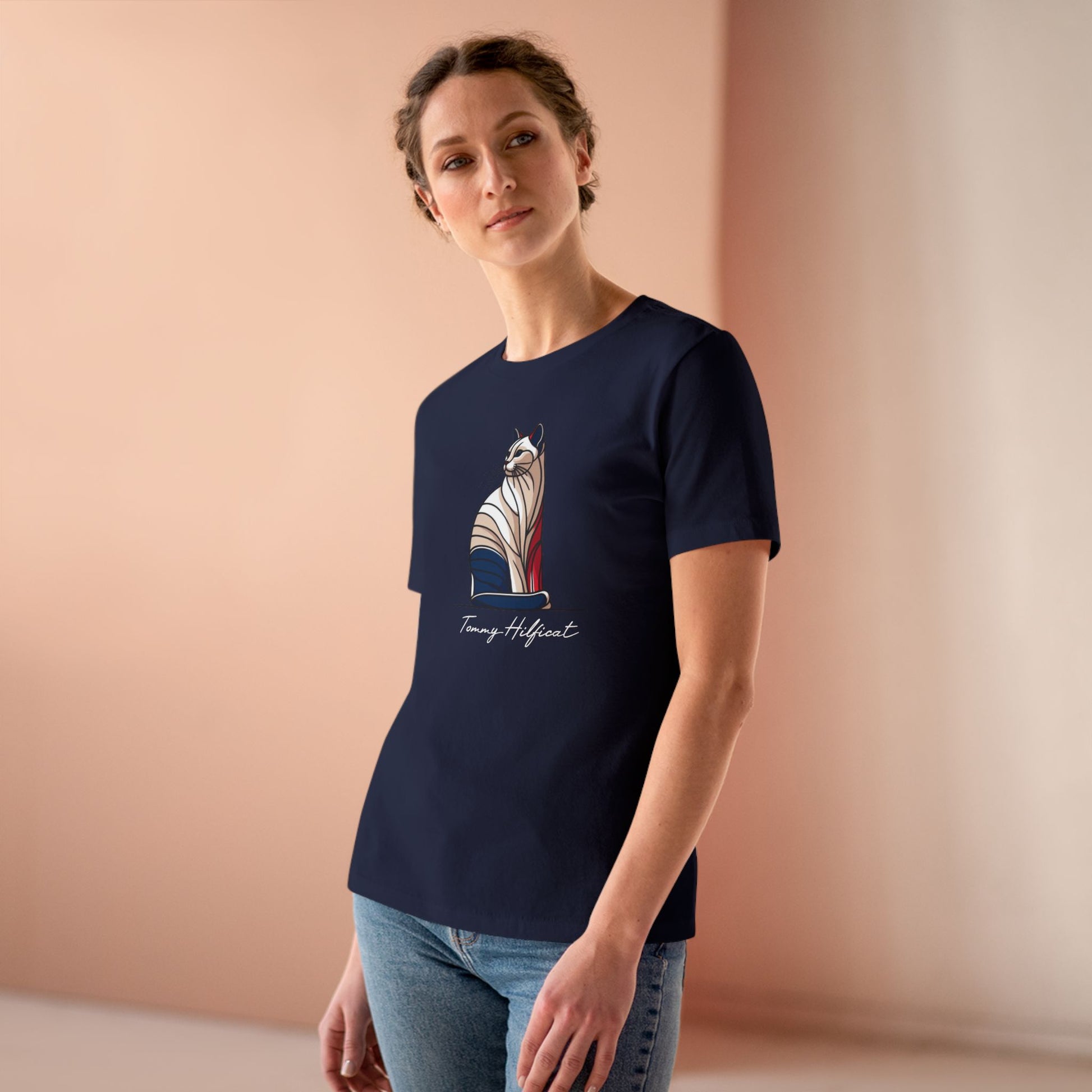 female model wearing Tommy Hilficat Sitting Icon T Shirt in Navy Blue, cat tee shirts women's