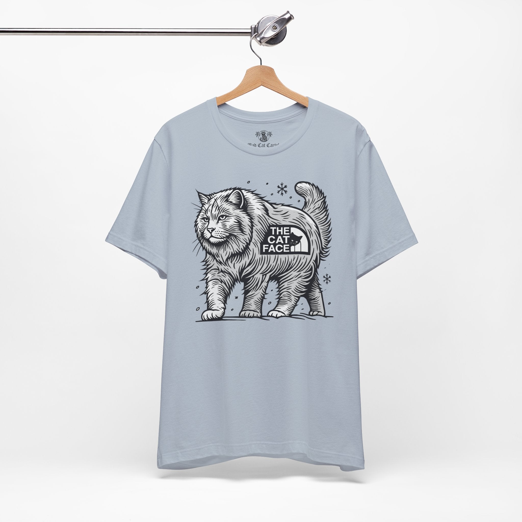 Light blue Snow Explorer cat shirt on hanger – cat clothes for humans