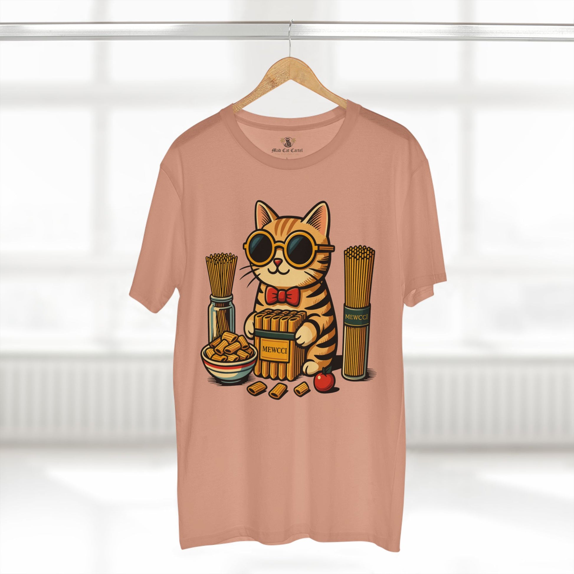 Mewcci Pasta Chef Cat Graphic T Shirt in Pale Pink on hanger – cute cat cooking tee