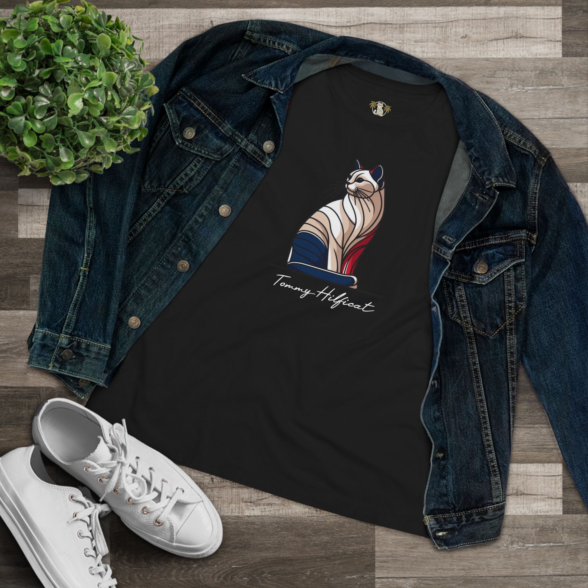 flat lay Tommy Hilficat Sitting Icon T Shirt in Black with denim, funny graphic t shirts for women