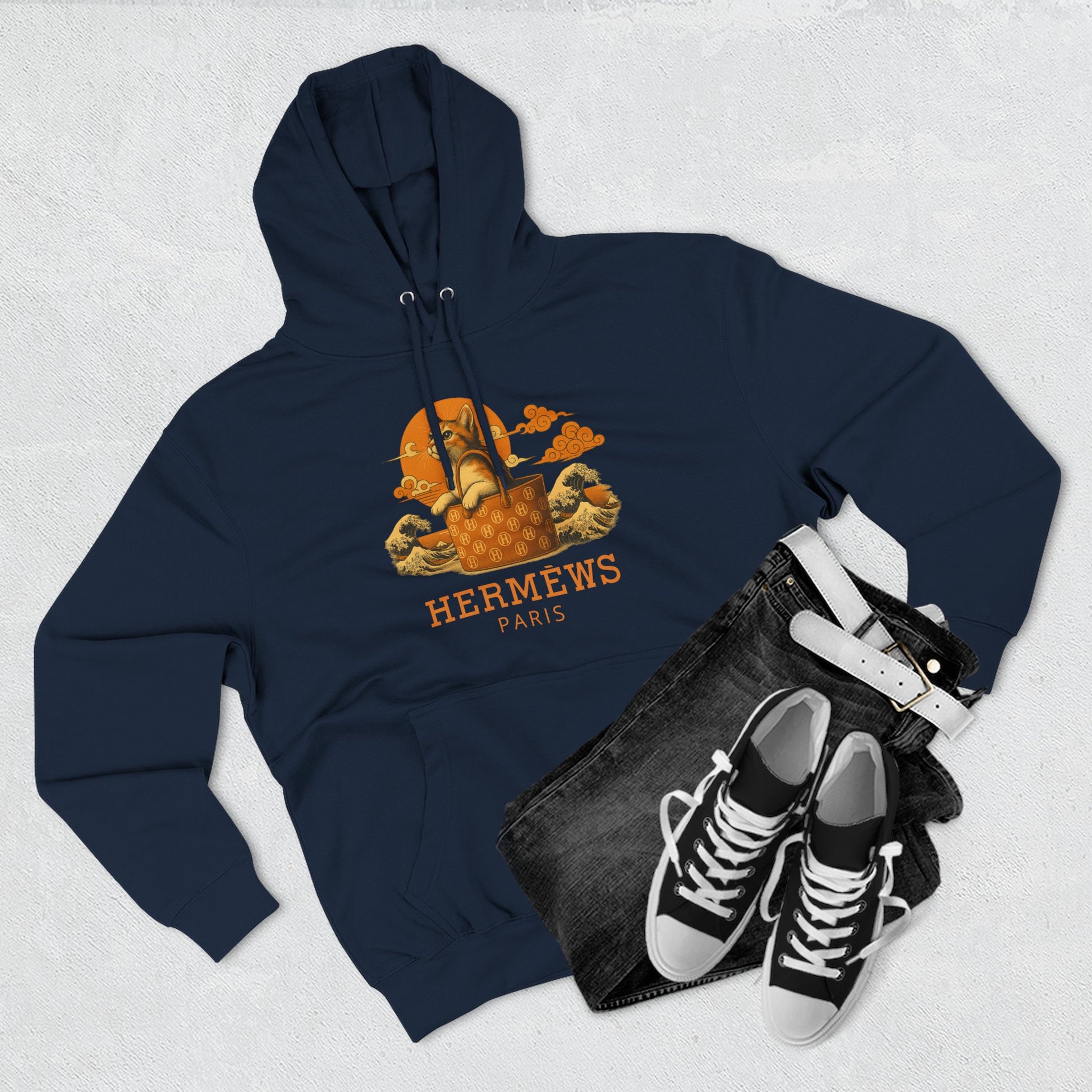 Flat lay of Hermèws navy hoodie with sneakers, womens hoodie for cat lovers
