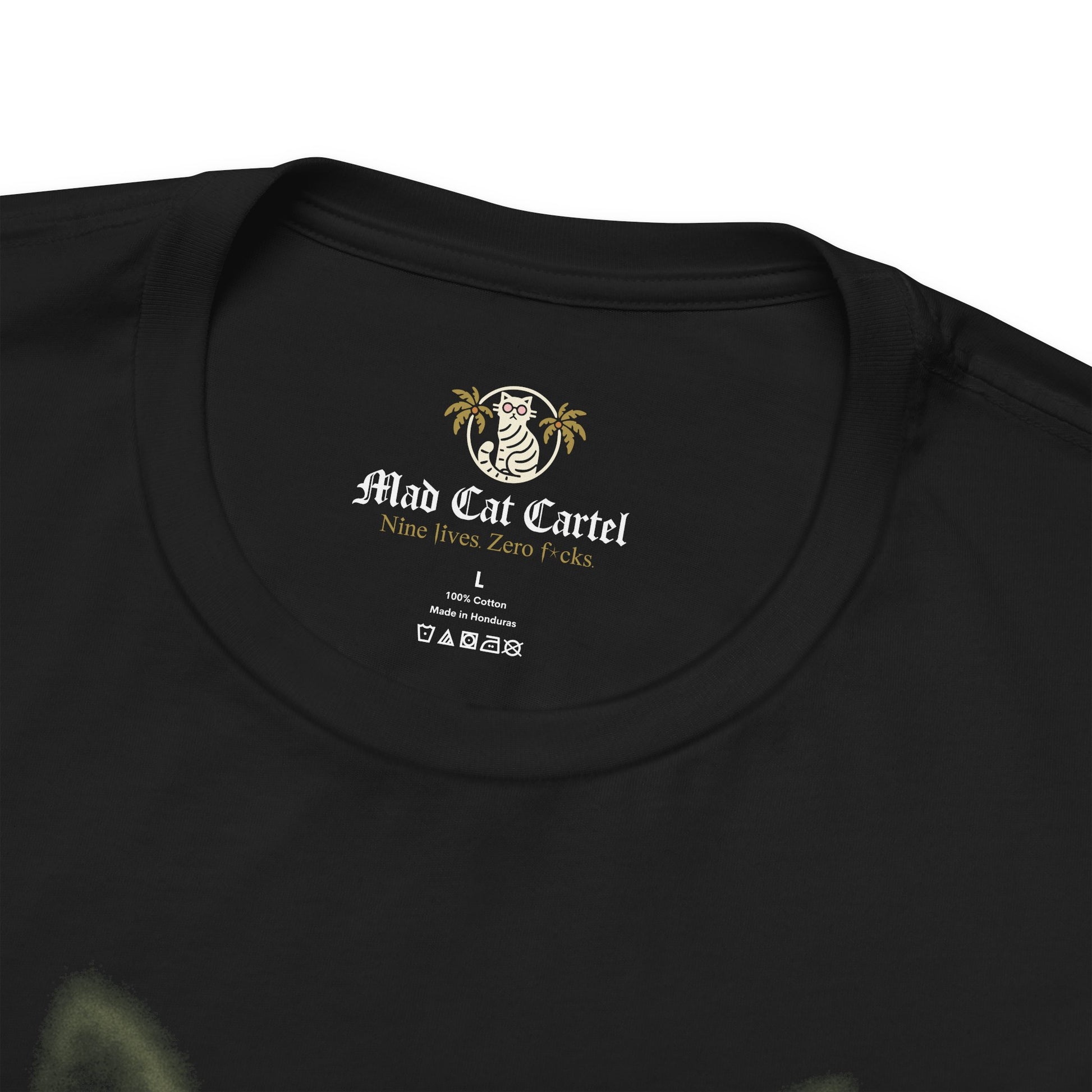 Closeup neckline of women's black cat graphic tee with Mad Cat Cartel label clothes with cats on them
