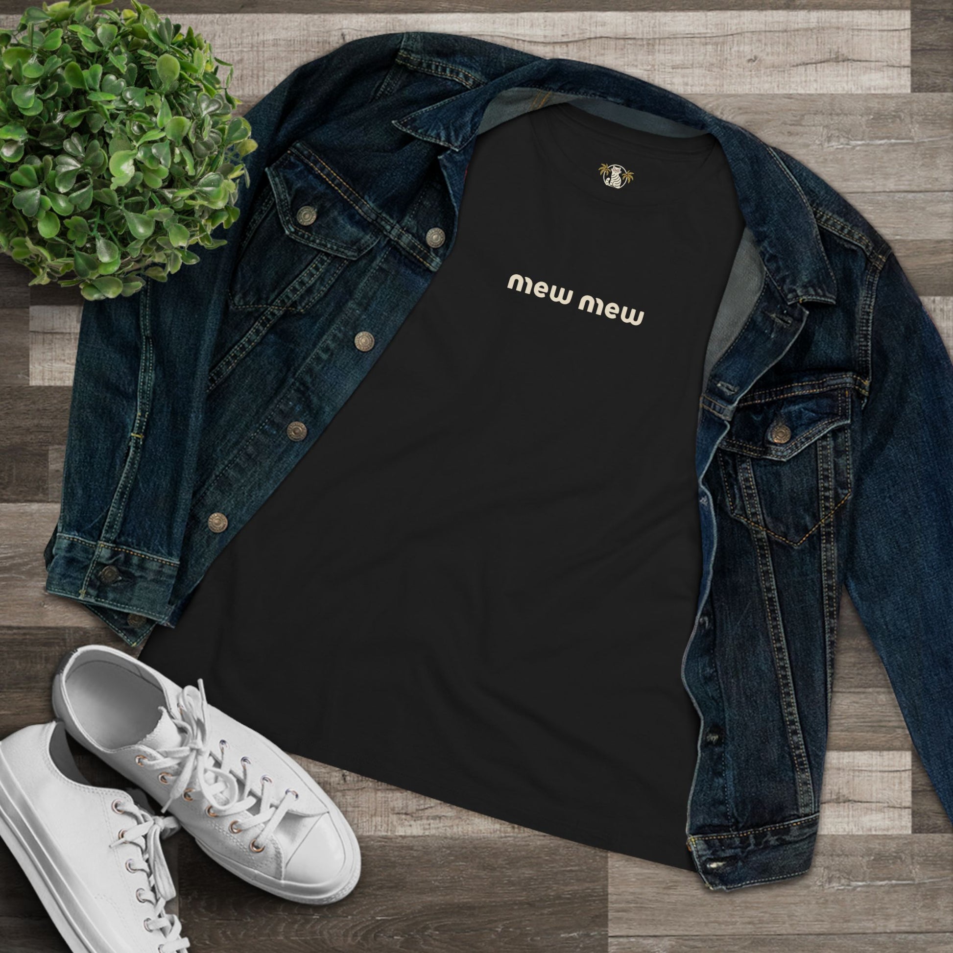 Black t shirt flat lay with jacket cat tee shirts women's