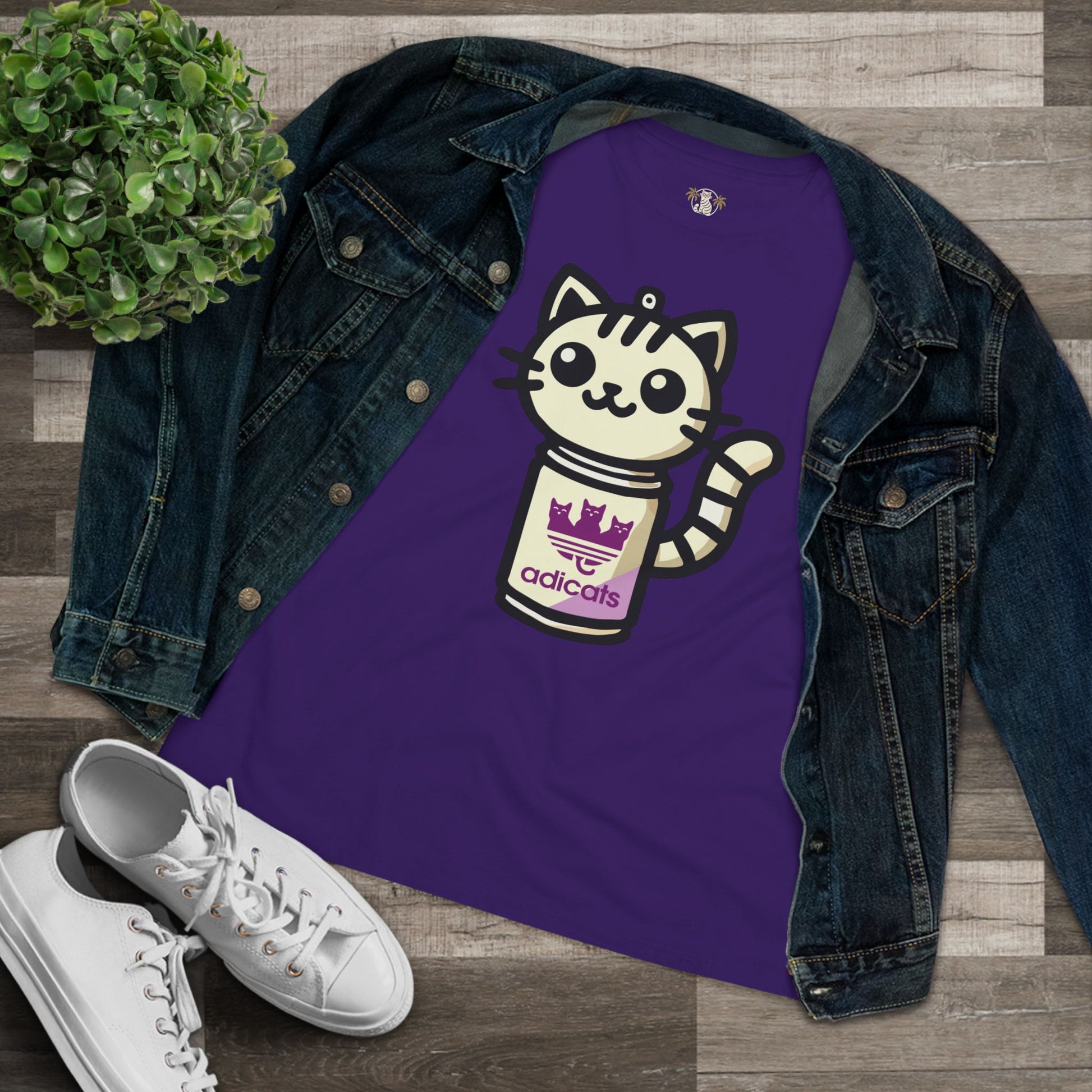 Team Purple cat shirts for women lifestyle flat lay with denim jacket