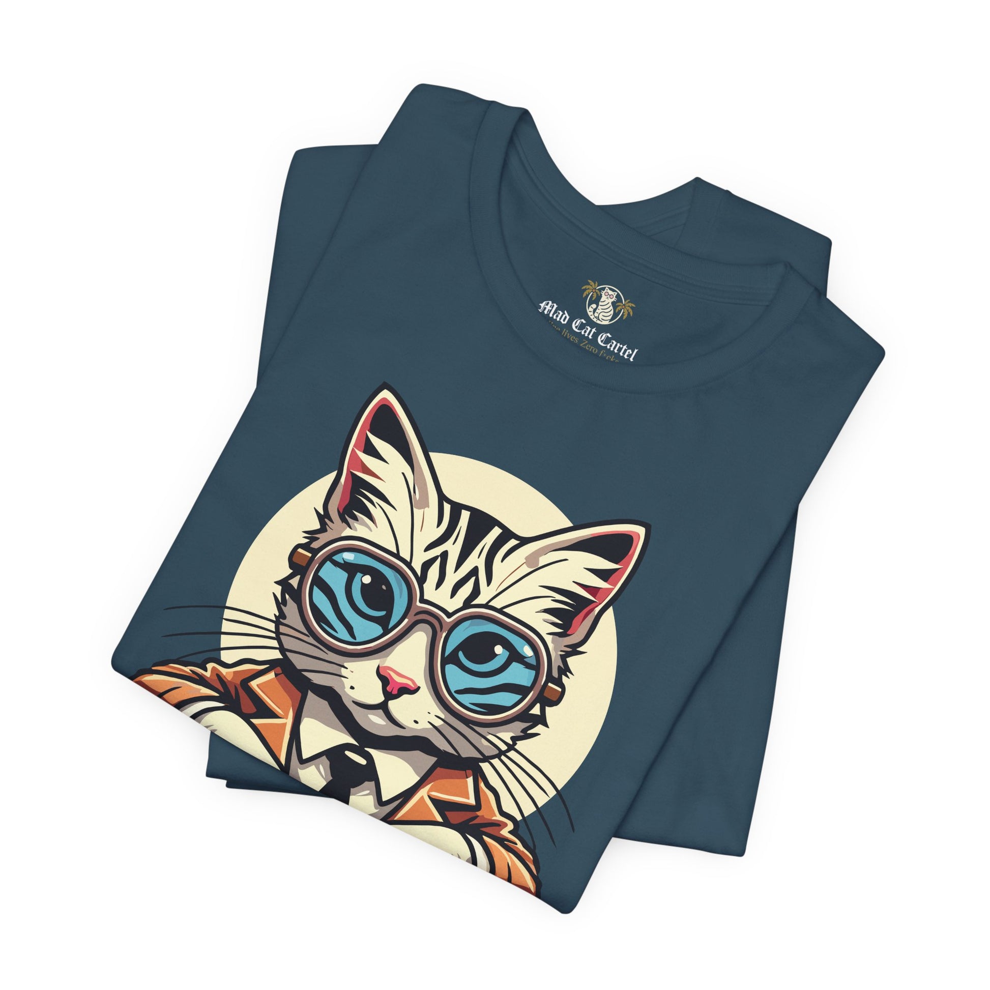 Deep Teal folded tee shirts with cats flat lay