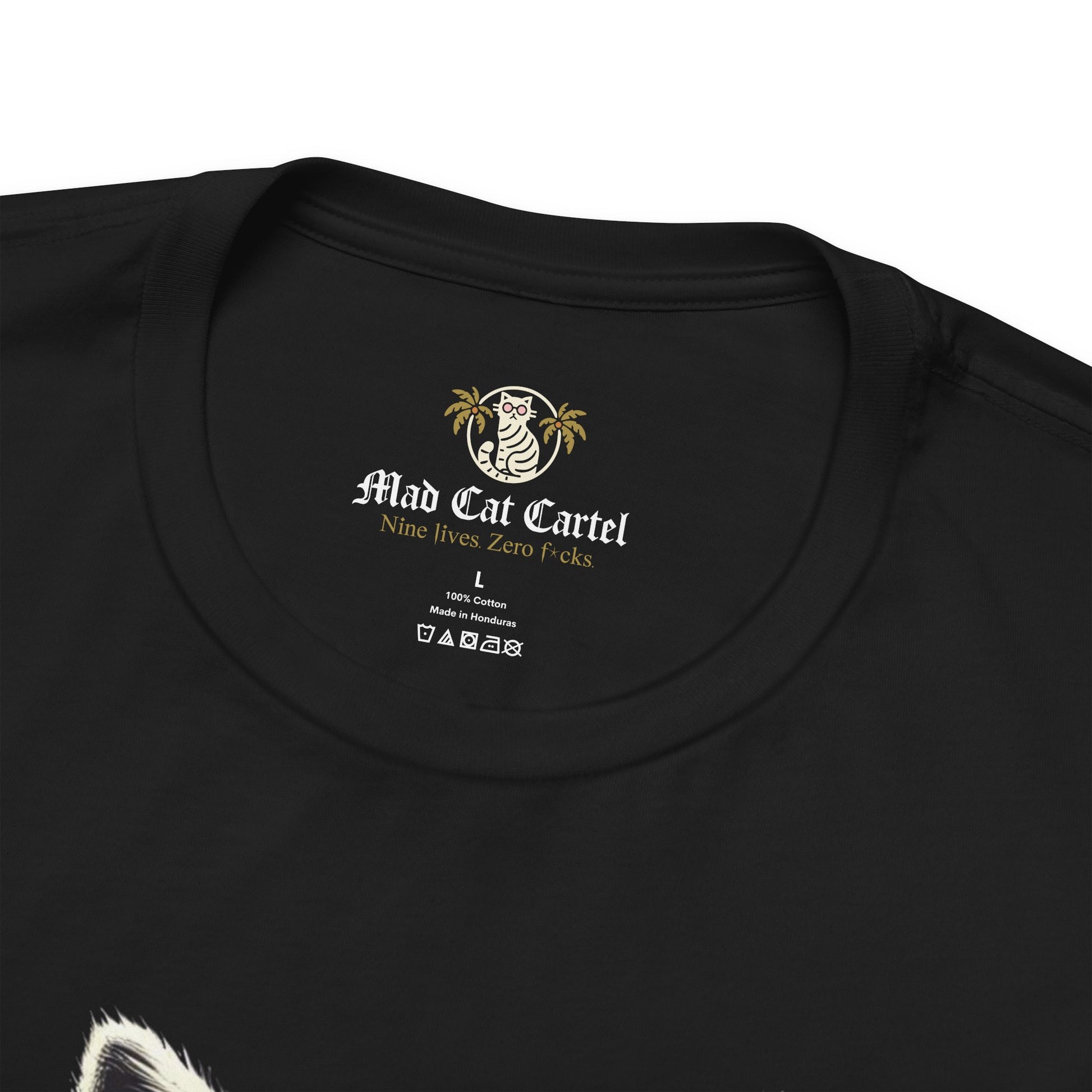 Close up neckline detail of Meowcler Ski Cat Graphic Black T Shirt branding