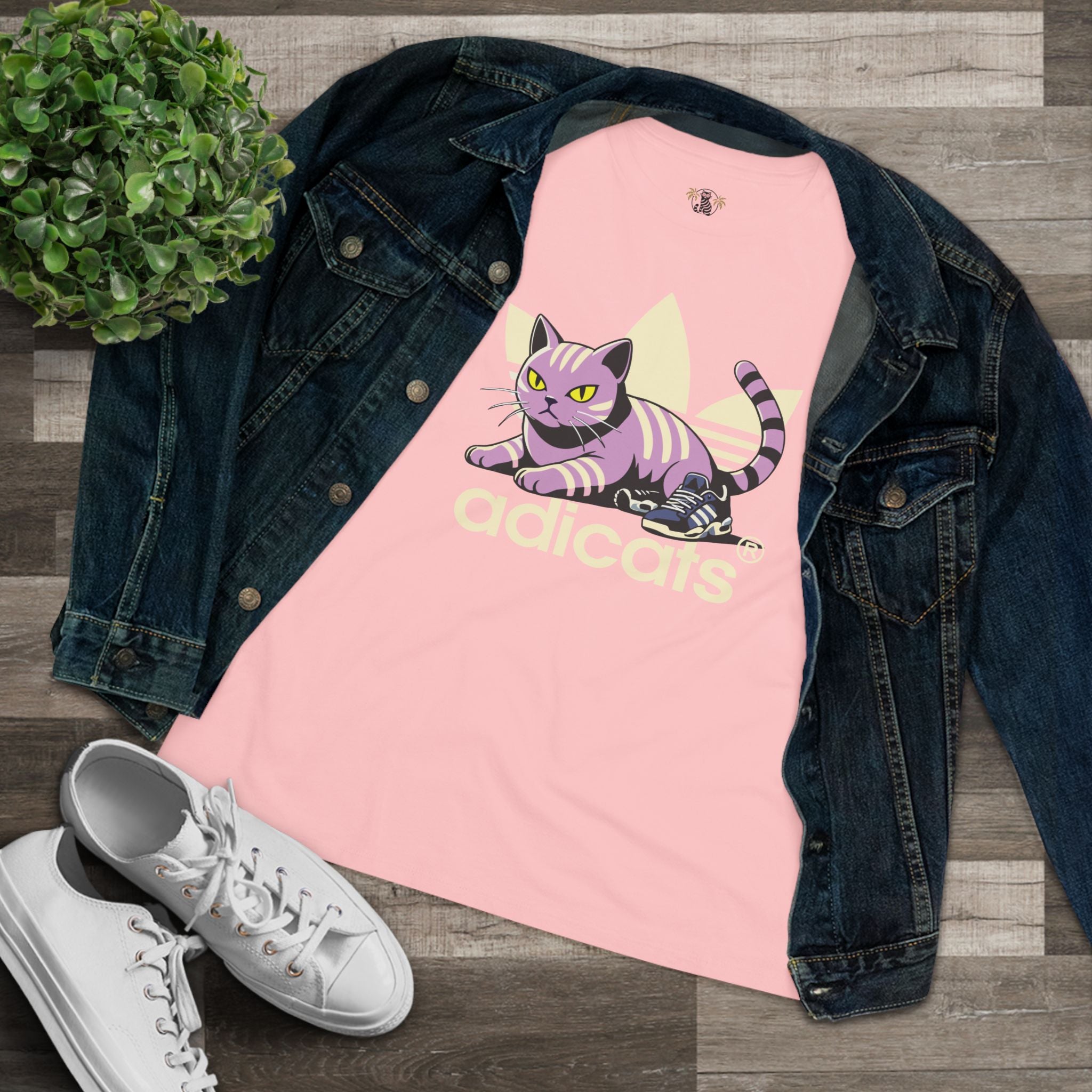 Pink parody t shirts lifestyle flat lay with denim jacket