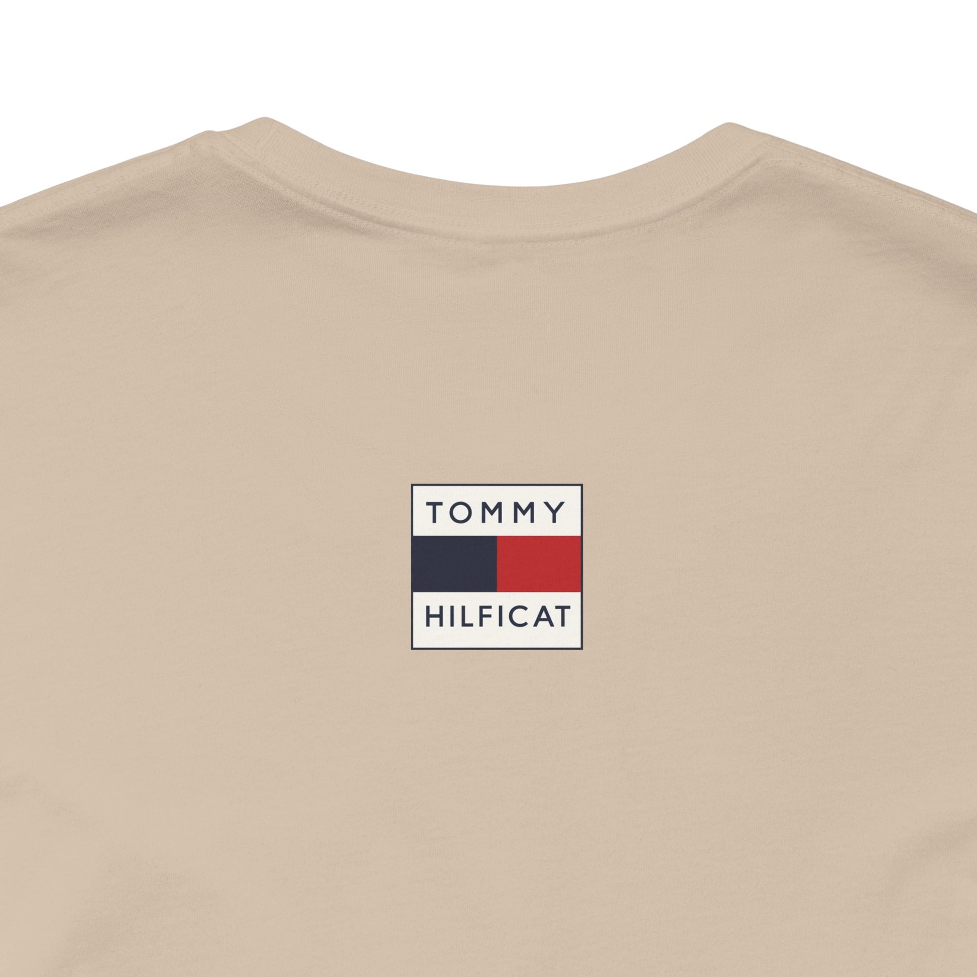 Tan cat themed clothing back label close up