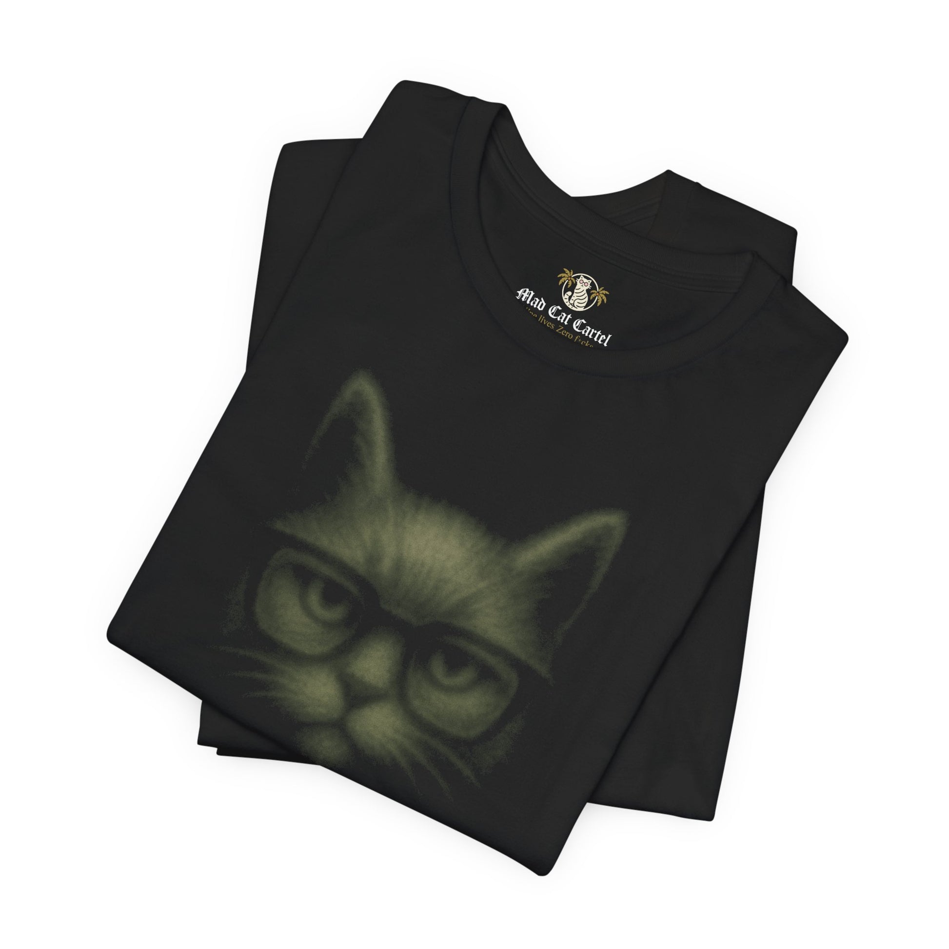Folded stack of black t shirts with cat wearing shades design cat tee shirts womens