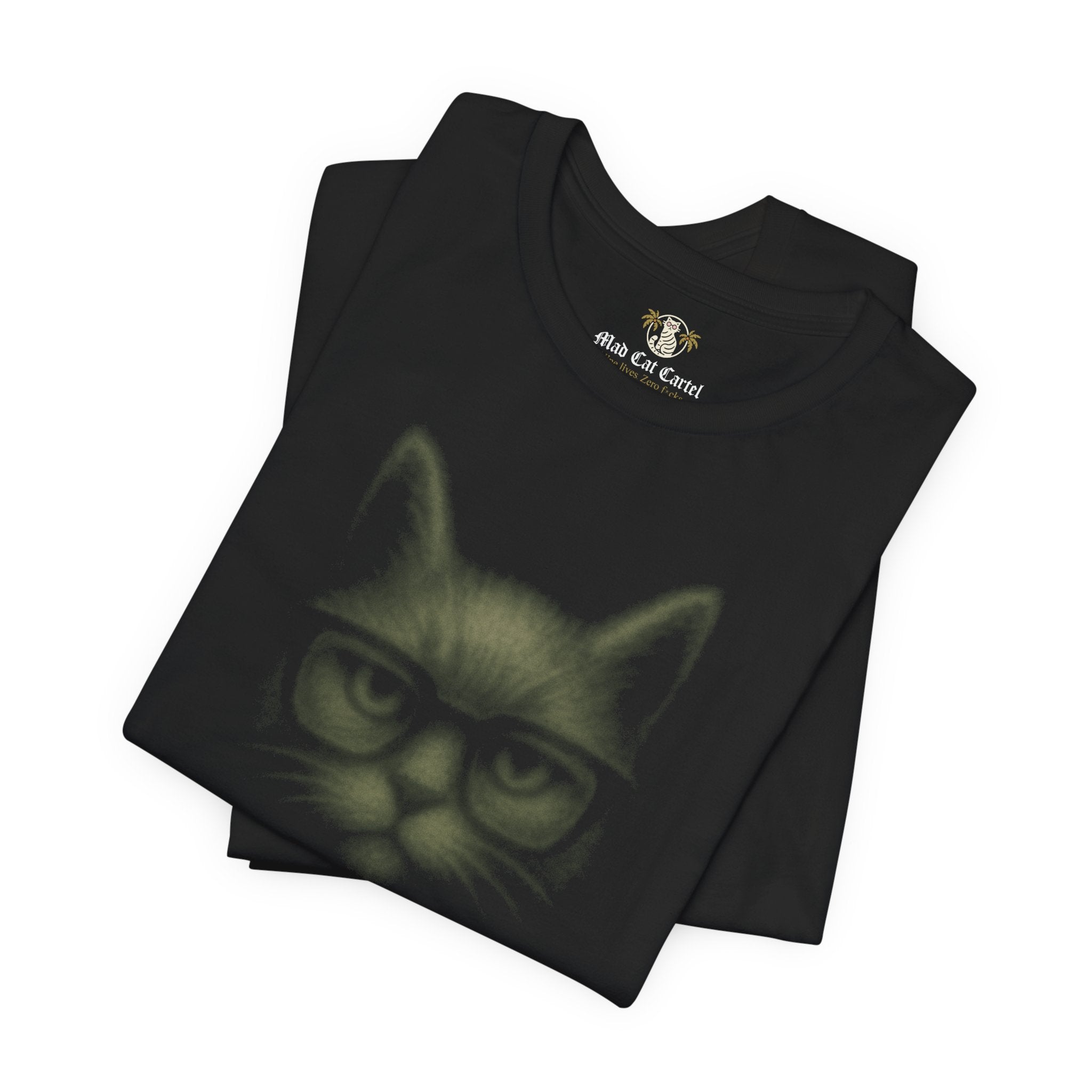 Folded stack of black t shirts with cat wearing shades design cat tee shirts womens