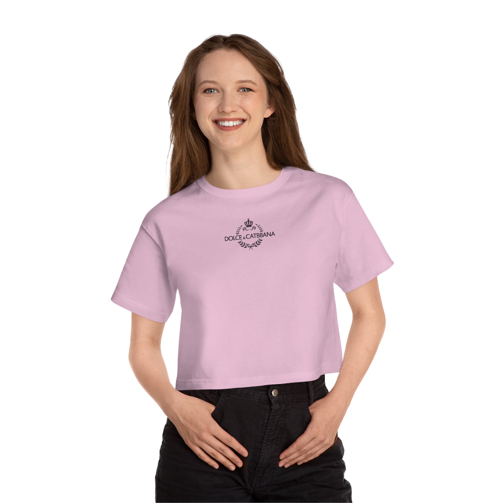 Model wearing pink crop top Dolce & Catbbana x Champion women’s tee