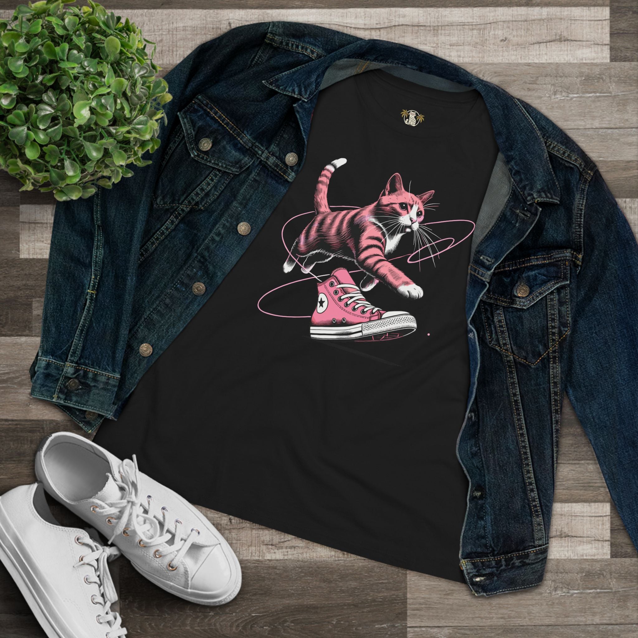 Black Catverse Apex Kick tee folded flat with denim jacket, cat shirts for women, cat on a shirt