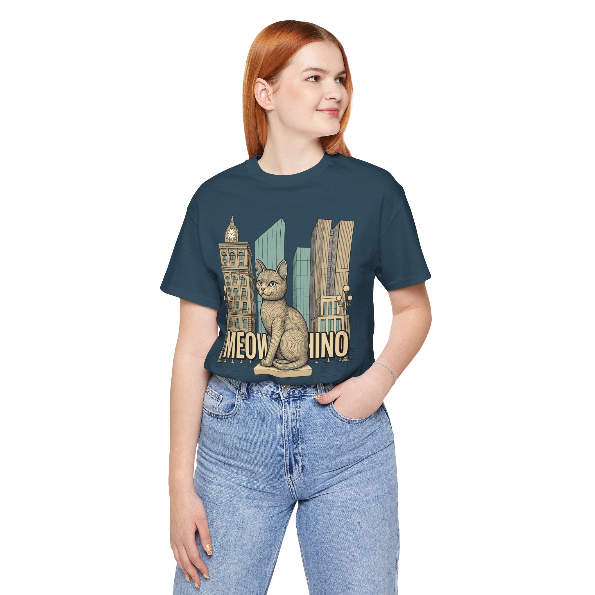 Gifts for cat lovers – white unisex tee worn by female model, Meowschino city cat statue graphic