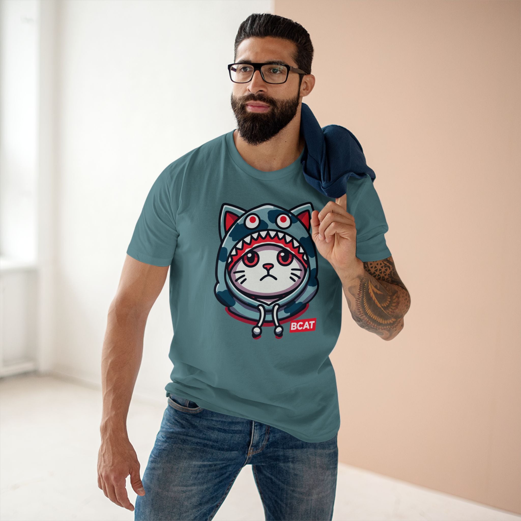A Bathing Cat BCAT Shark Mode Cat Graphic T-Shirt in slate blue, worn by a male model