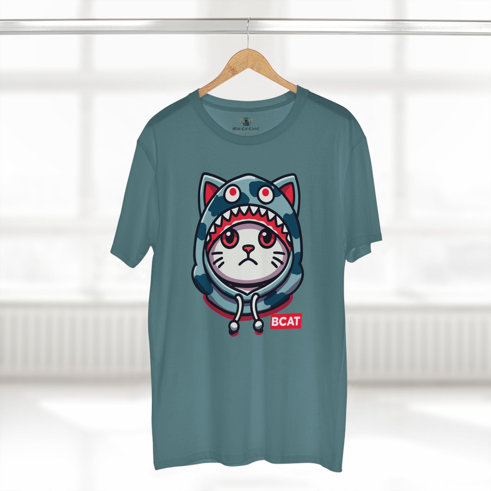 A Bathing Cat BCAT Shark Mode Cat Graphic T-Shirt in slate blue, on a hanger