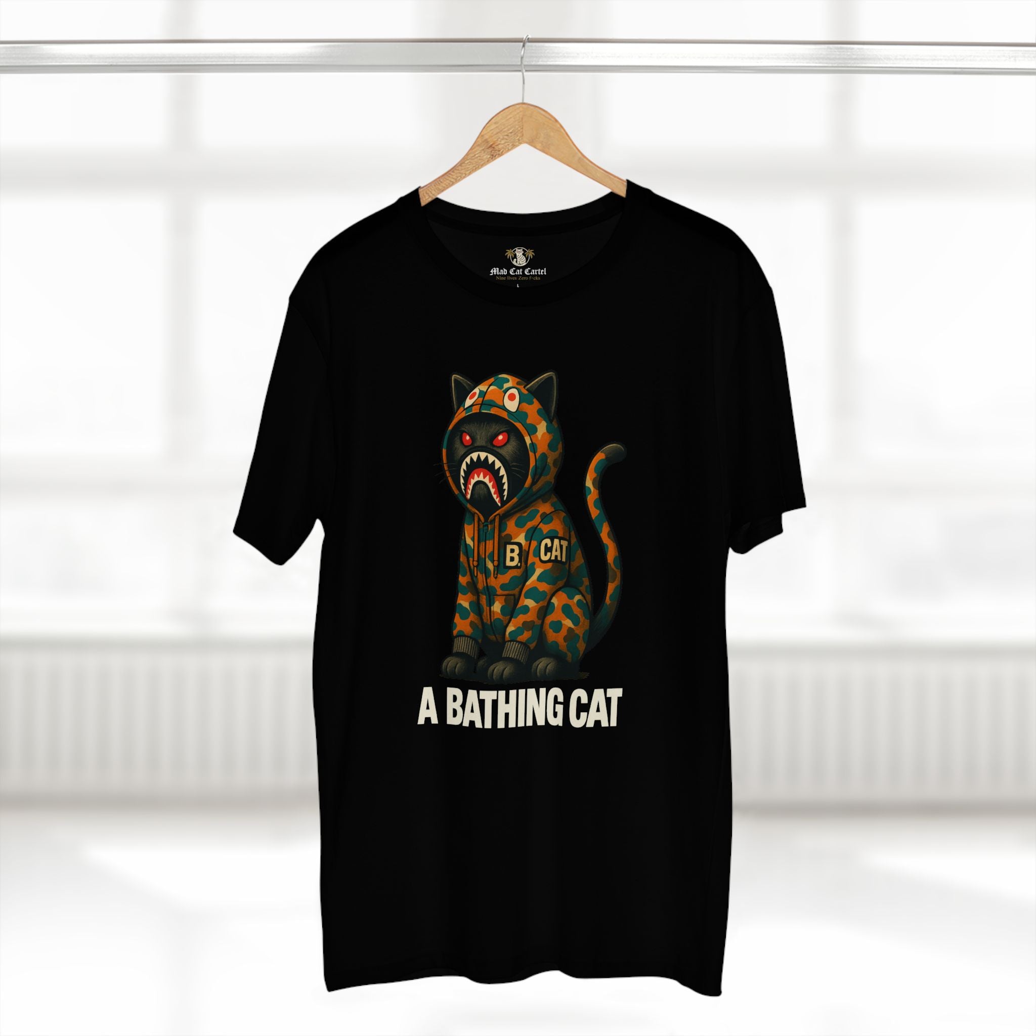 A Bathing Cat Jungle Predator Graphic T-Shirt in black, on a hanger