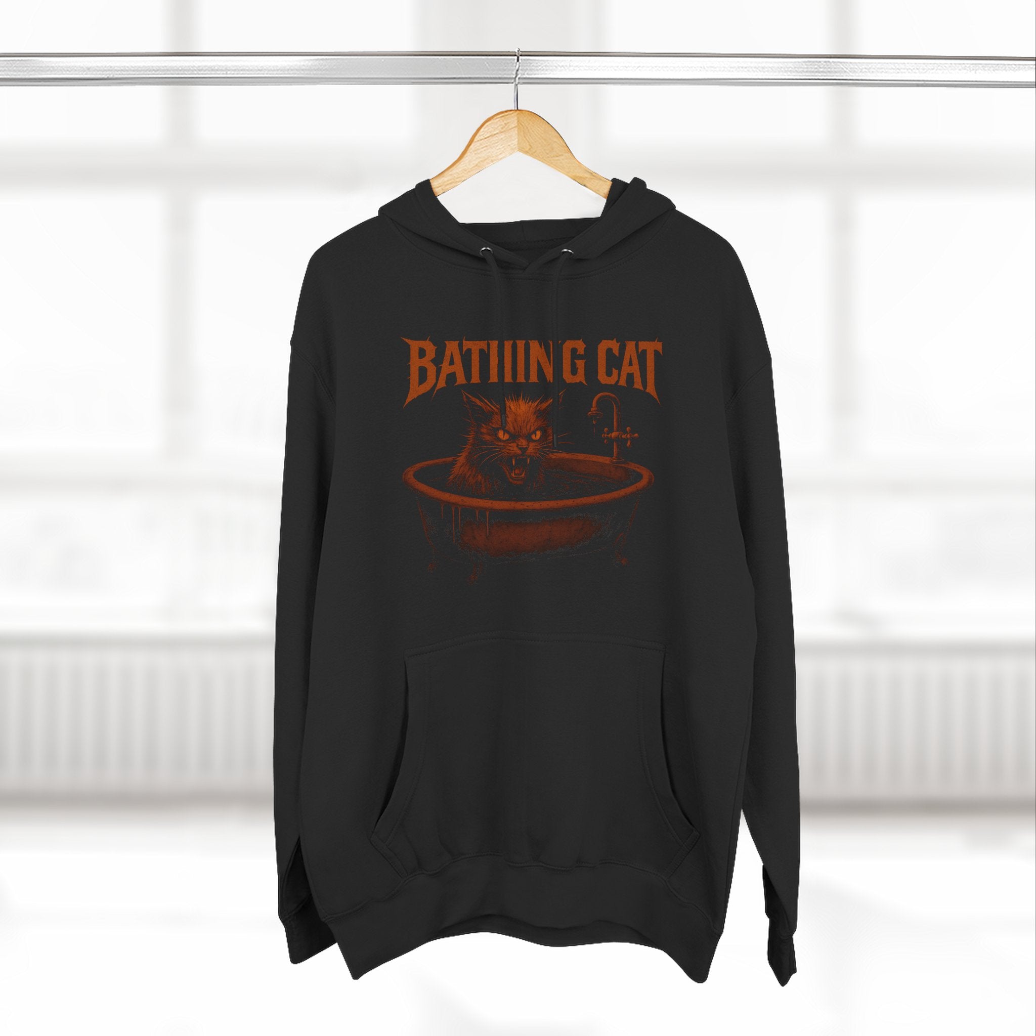 A Bathing Cat Tub Rage Graphic Black Hoodie, on a hanger