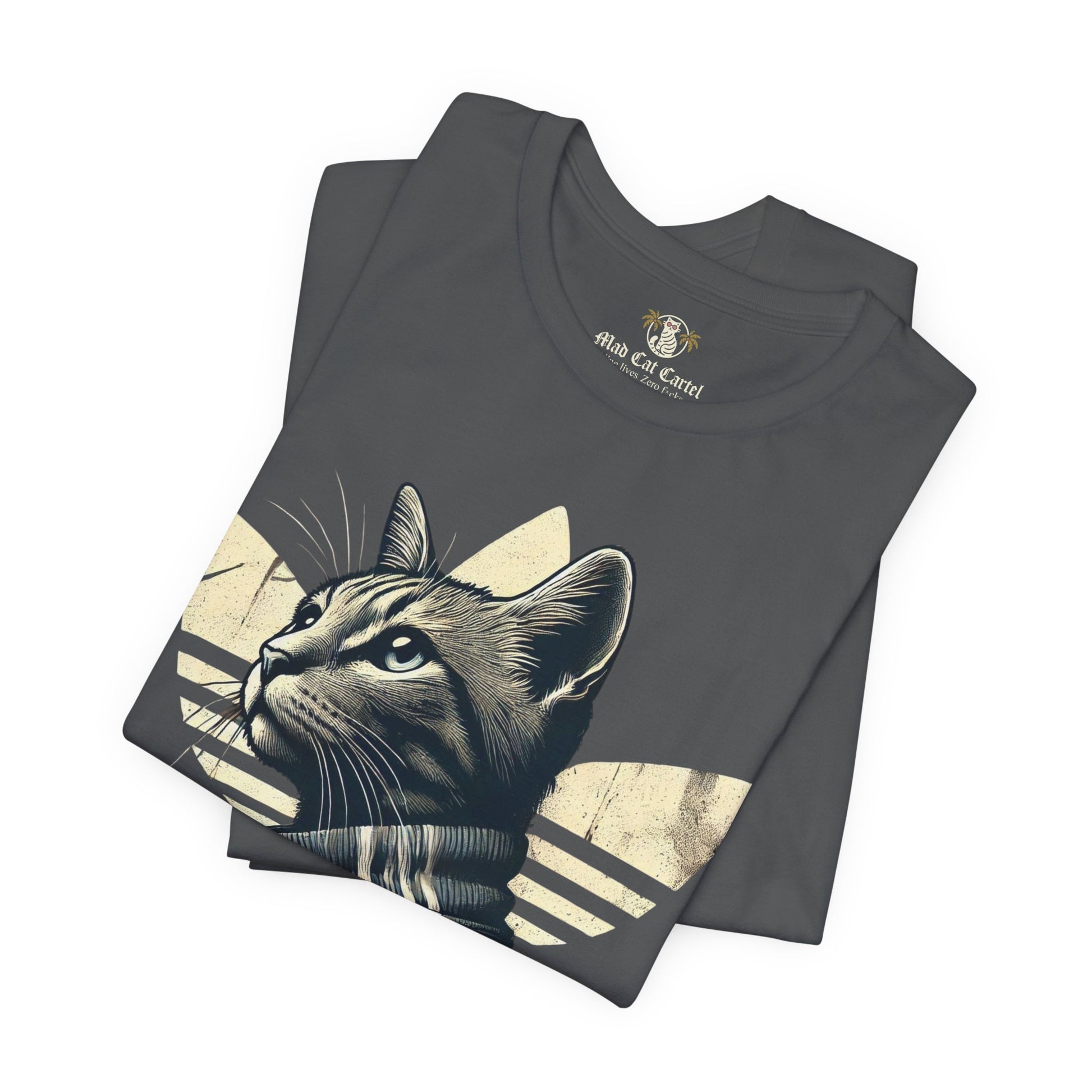 folded asphalt gray Adicats tees, close up of cat design, cotton parody t shirt for cat lovers