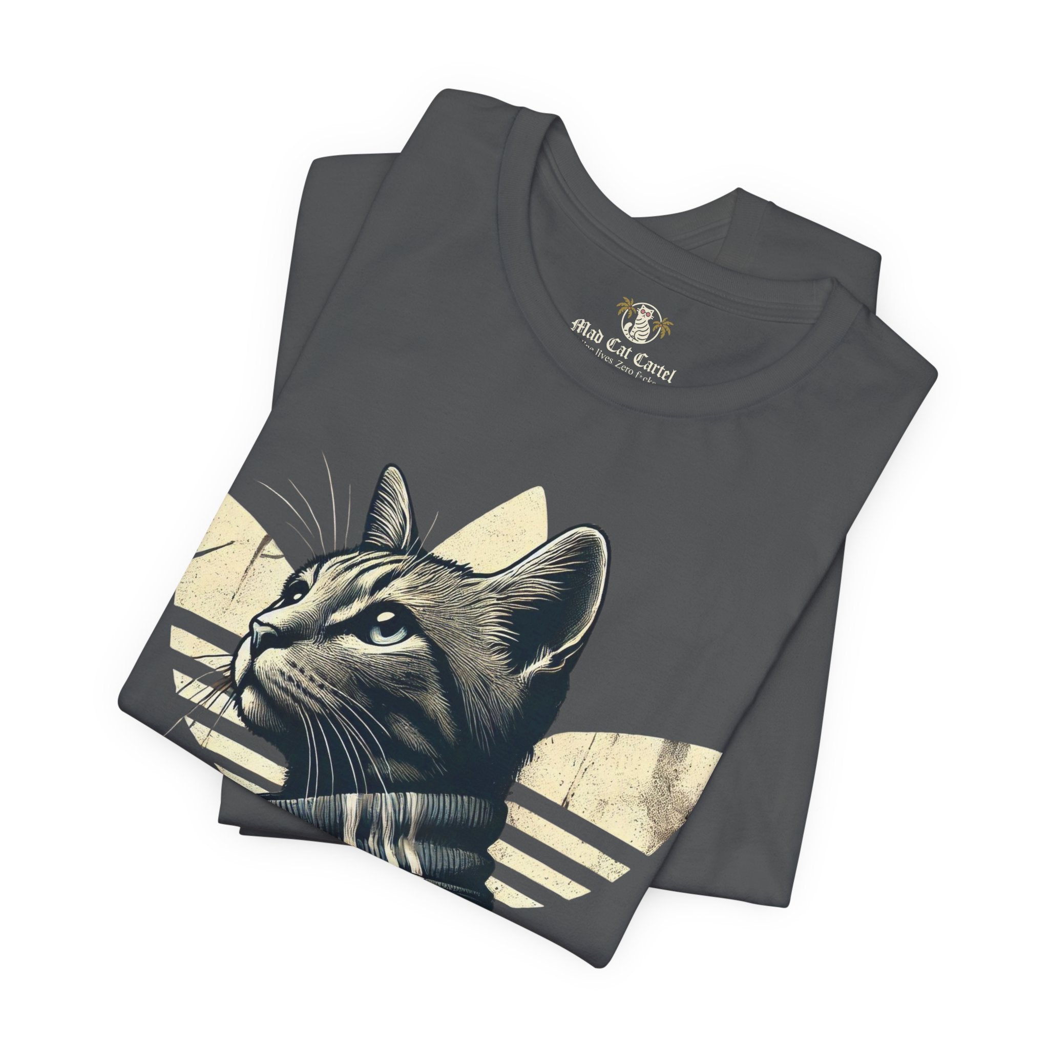folded asphalt gray Adicats tees, close up of cat design, cotton parody t shirt for cat lovers