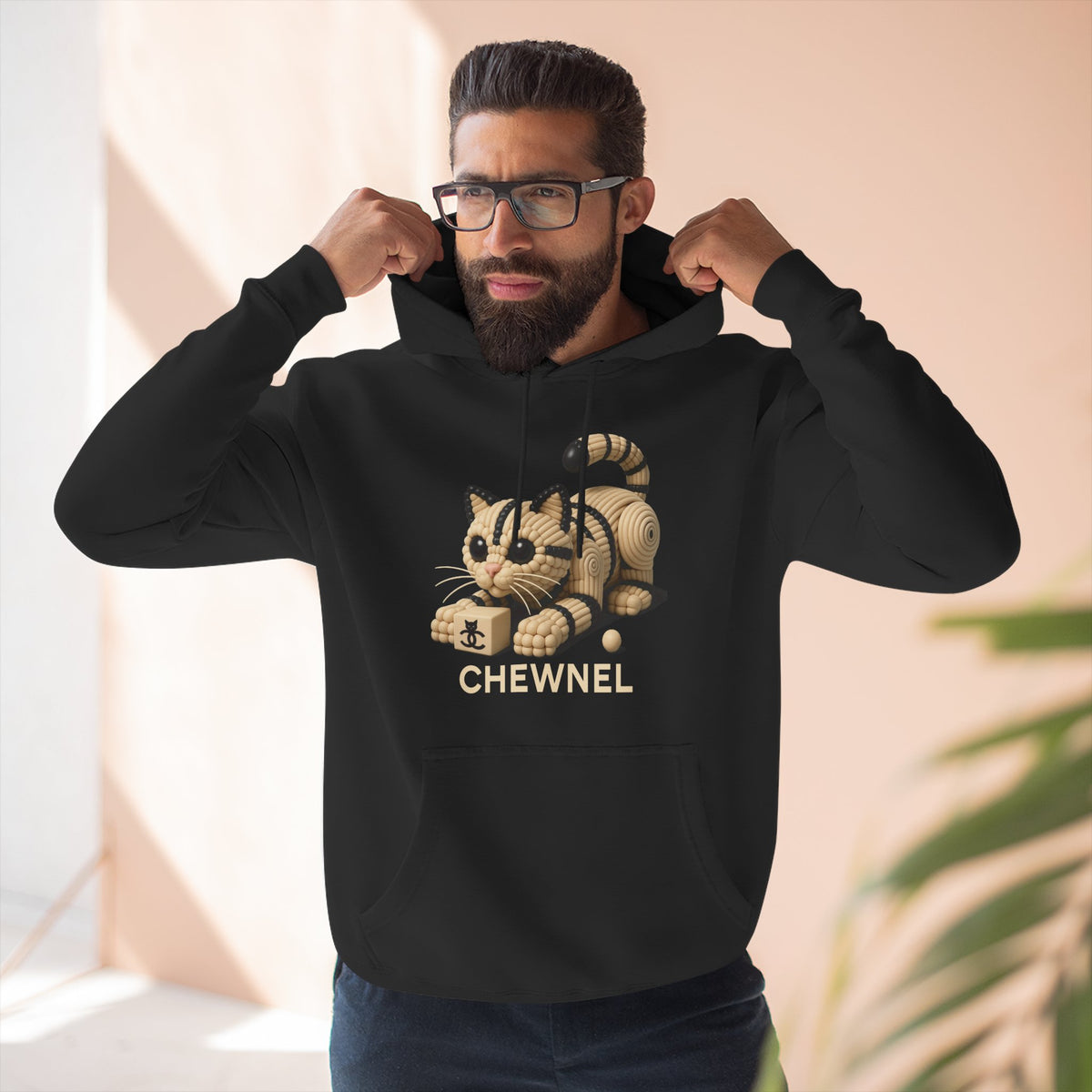 Chewnel Luxury In Pieces Cat Graphic Hoodie in black, worn by a male model