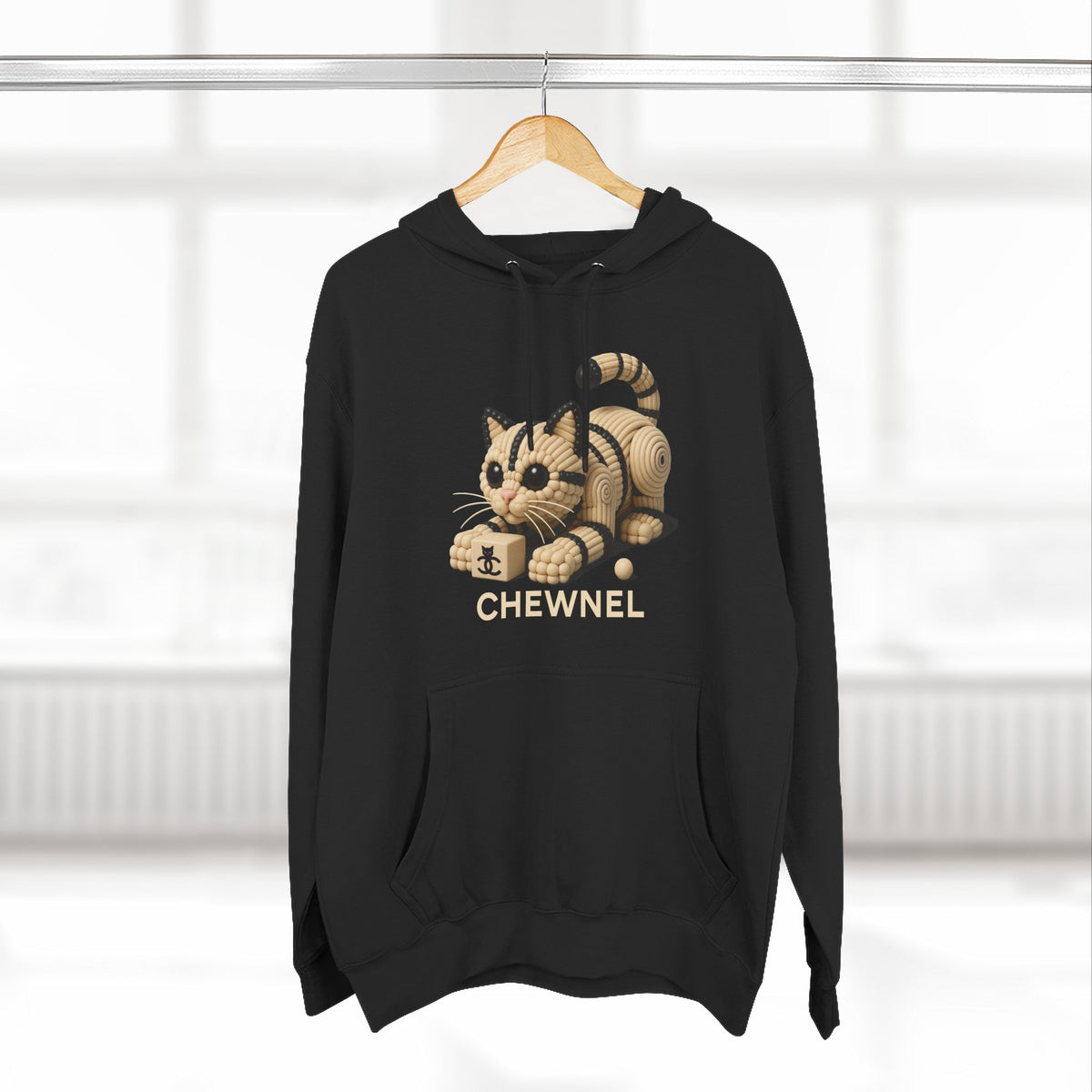 Chewnel Luxury In Pieces Cat Graphic Hoodie in black, on a hanger