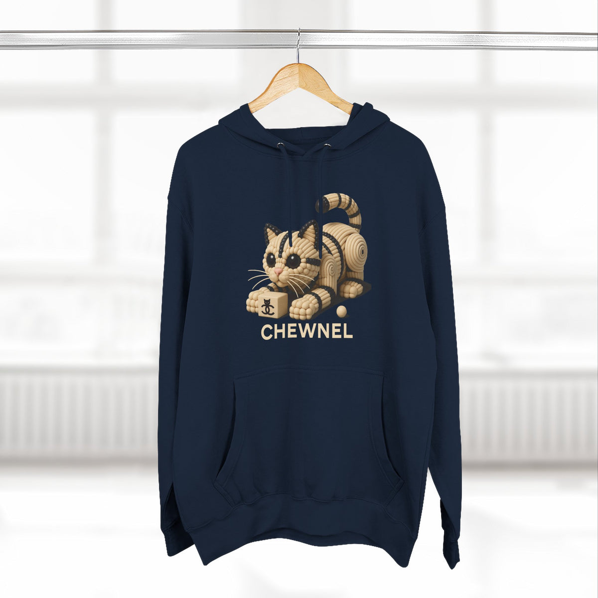 Chewnel Luxury In Pieces Cat Graphic Hoodie in navy, on a hanger