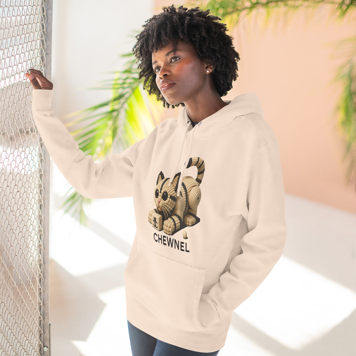 Chewnel Luxury In Pieces Cat Graphic Hoodie in pale pink, worn by a female model