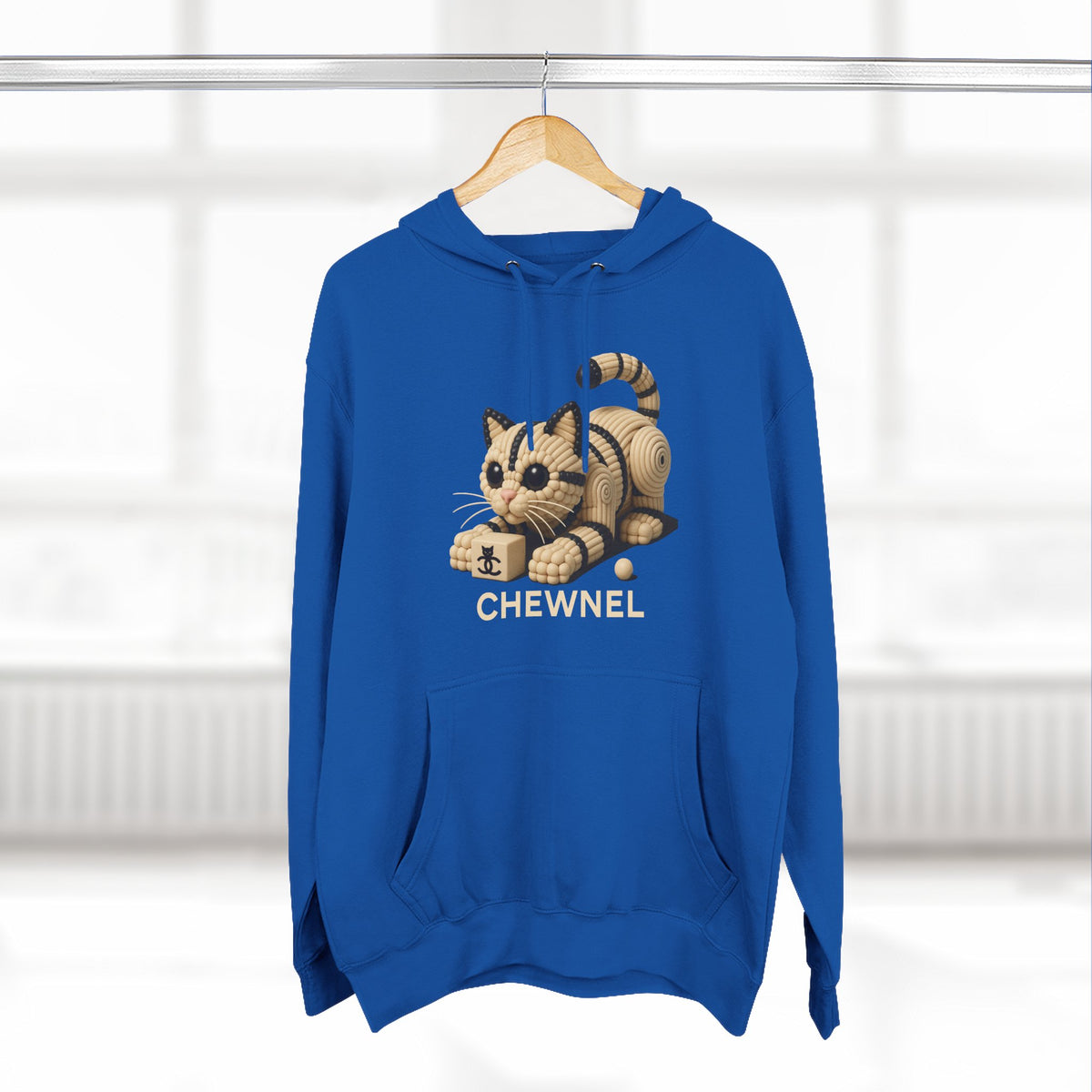 Chewnel Luxury In Pieces Cat Graphic Hoodie in royal blue, on a hanger