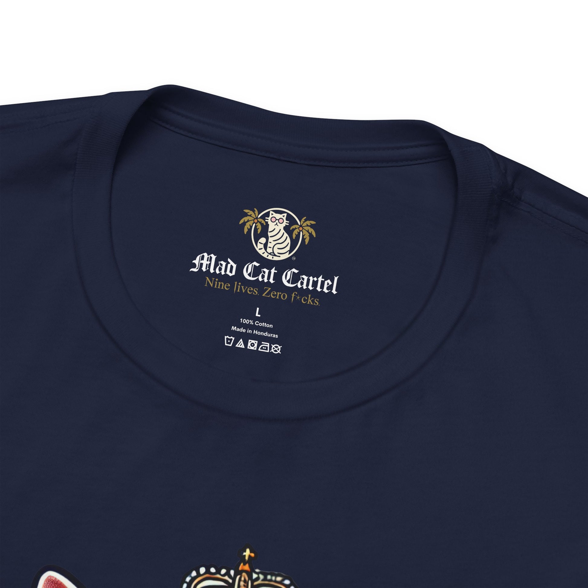 close-up neckline of navy Dolce & Catbbana Don Royal t shirt, Mad Cat Cartel branding detail