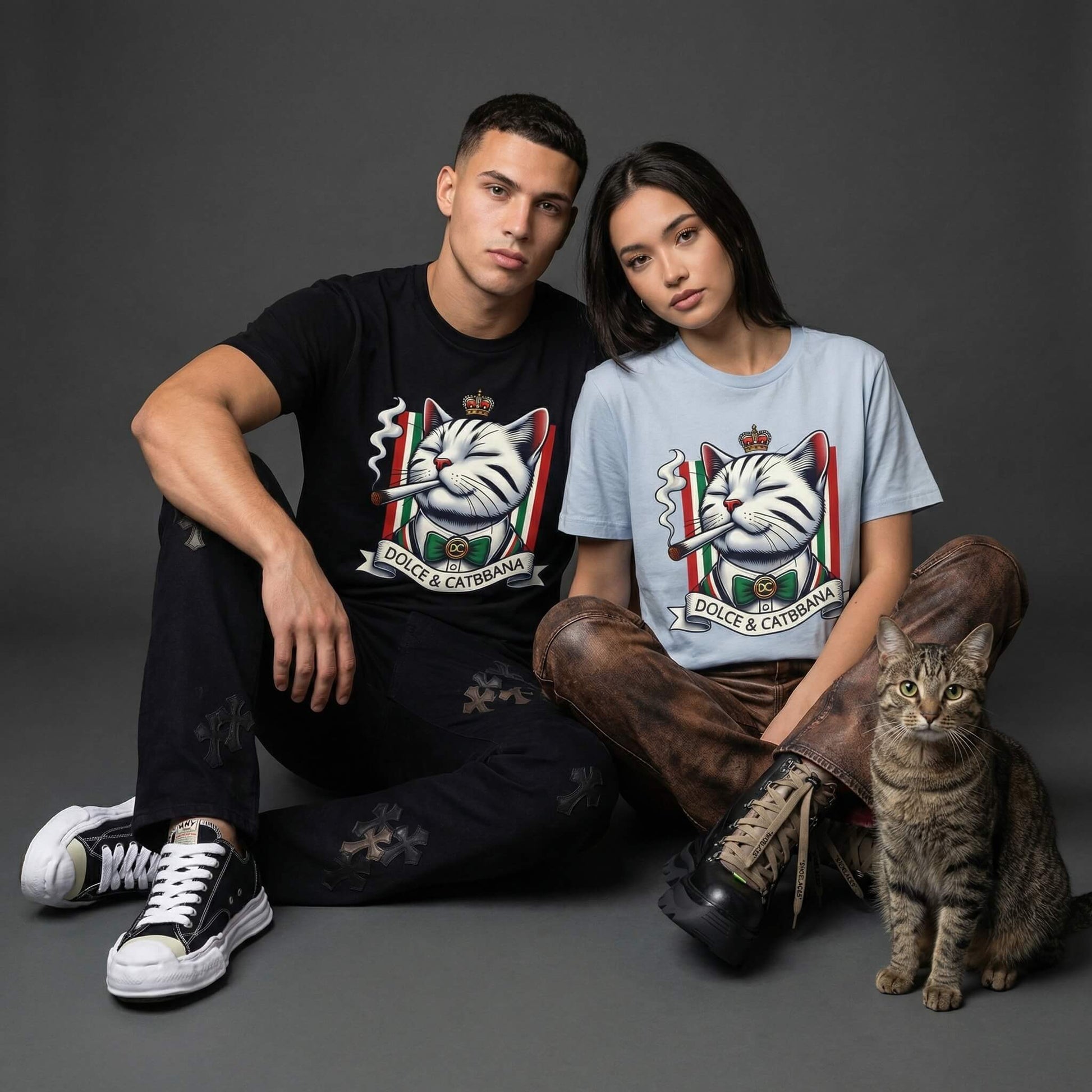 Dolce and Catbbana graphic t shirts by Mad Cat Cartel worn by a man and woman in black and light blue with tabby cat
