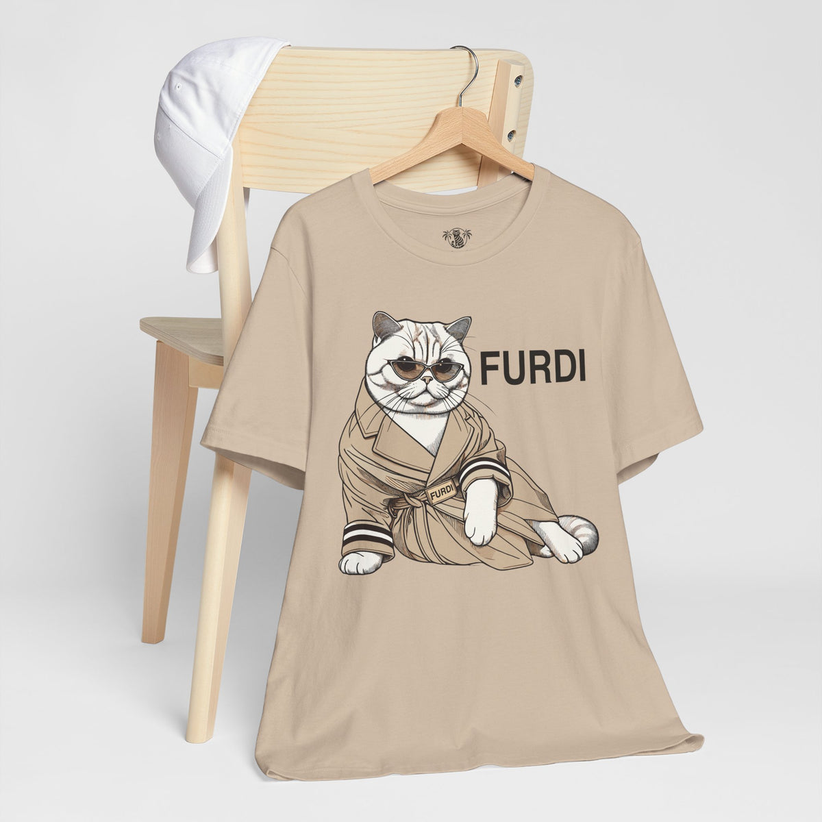 Furdi Lounge Royal Cat Graphic T-Shirt in tan, styled in a lifestyle setting