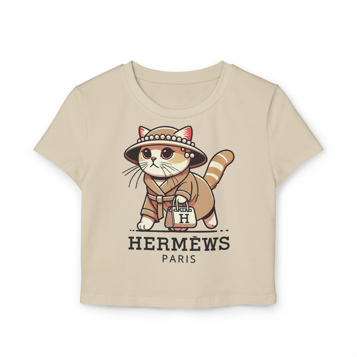 Hermèws Paris Chic Cat Graphic Women's Baby Tee in sand, flat lay