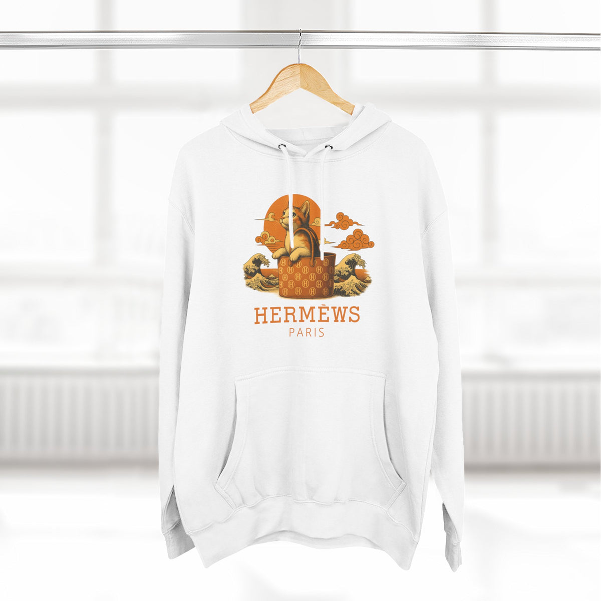Hermèws Paris Sunset Voyage Cat Graphic Hoodie in white, on a hanger