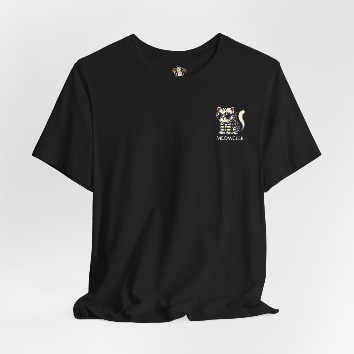 Meowcler Mini Puff Chest Graphic Cat T-Shirt in black, flat lay