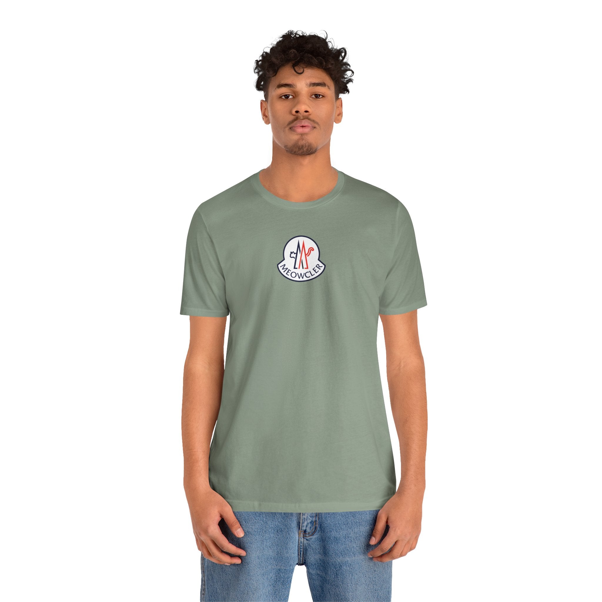 Meowcler Snowpuff Prestige Graphic T-Shirt in sage, worn by a male model