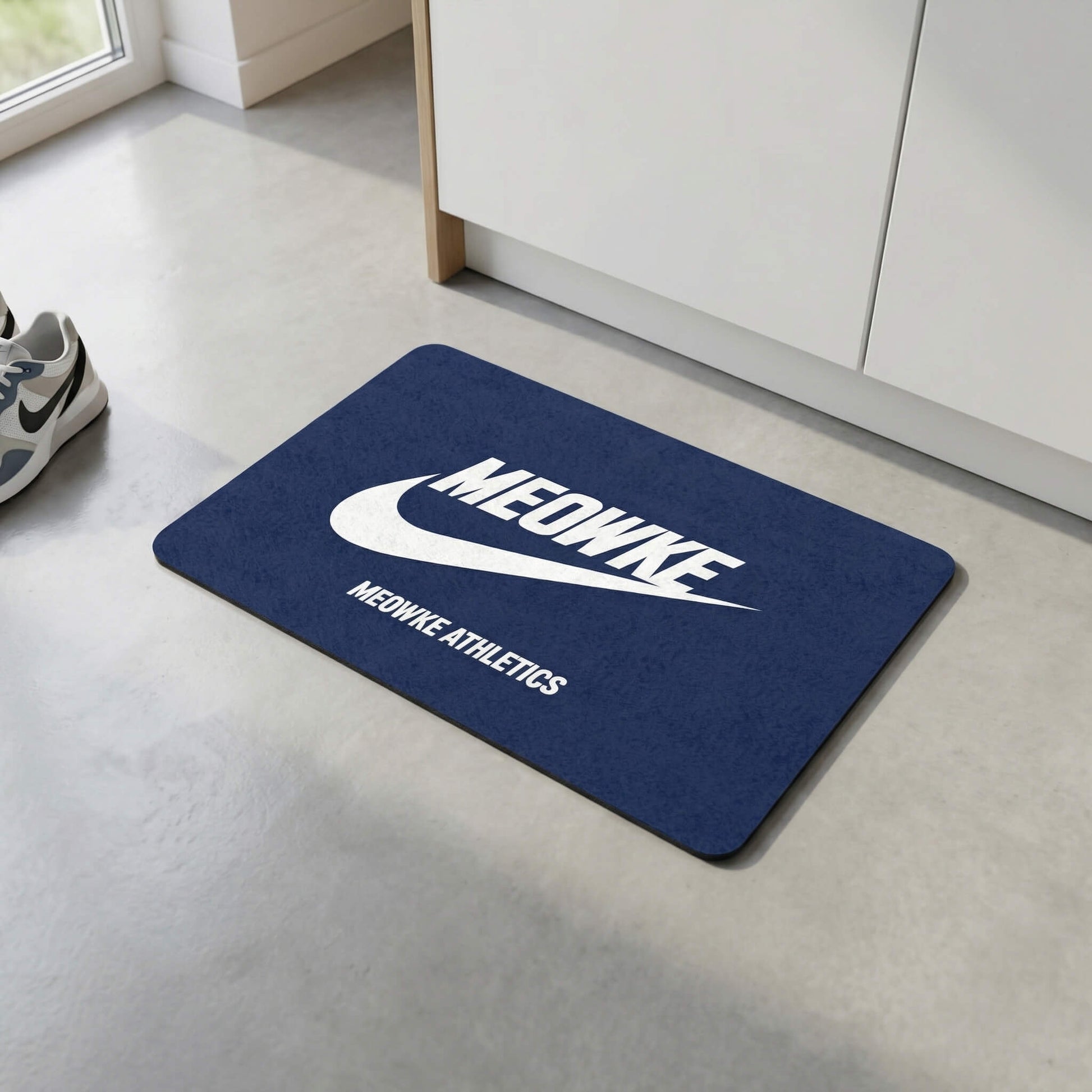 Blue Meowke feeding station mat for cats with sporty branding in a modern interior