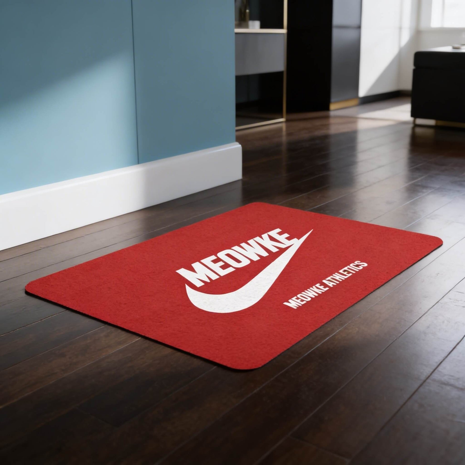 Red Meowke feeding station mat for cats with sporty branding in a modern interior