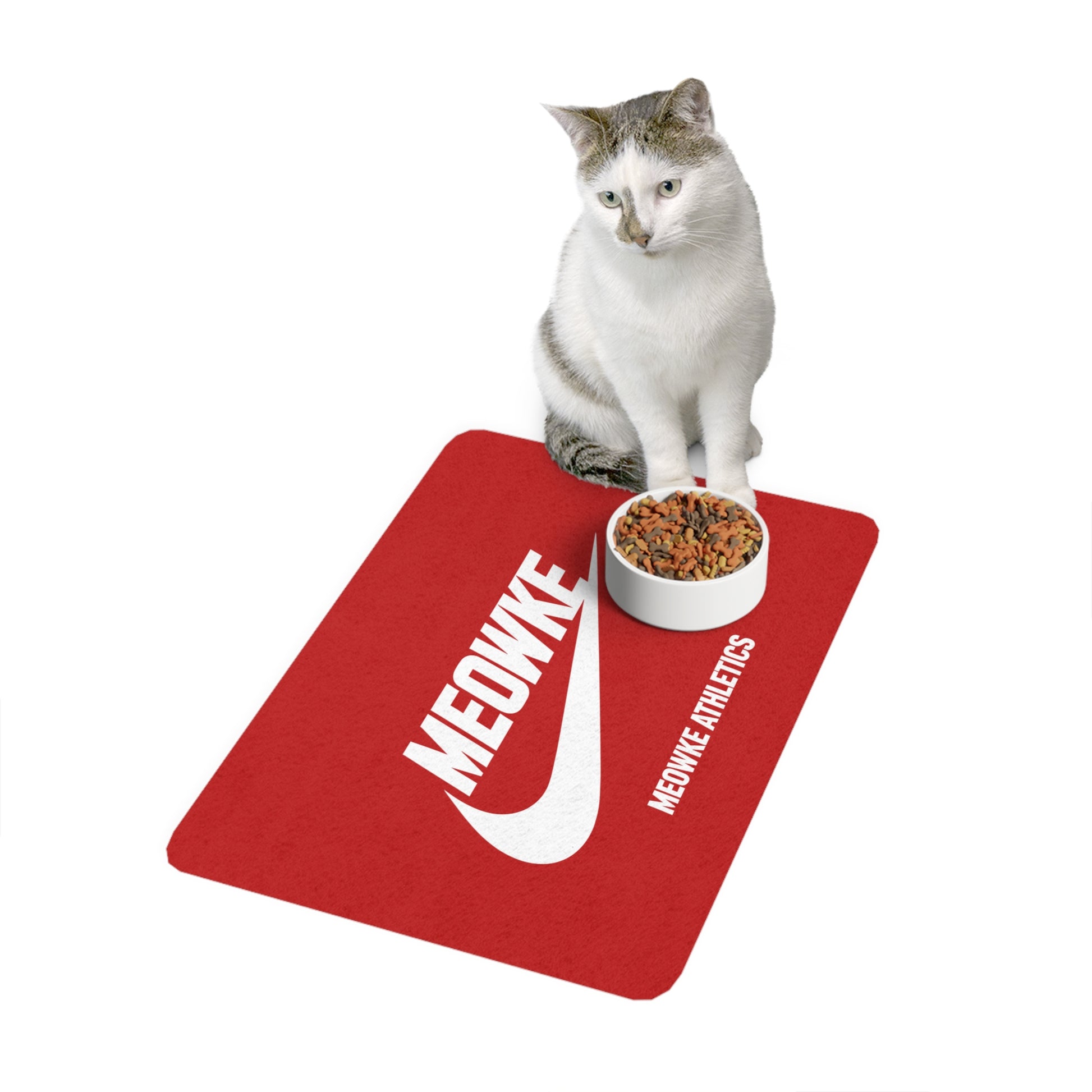 Meowke red cat food mat with seated cat and bowl on a sport inspired logo design