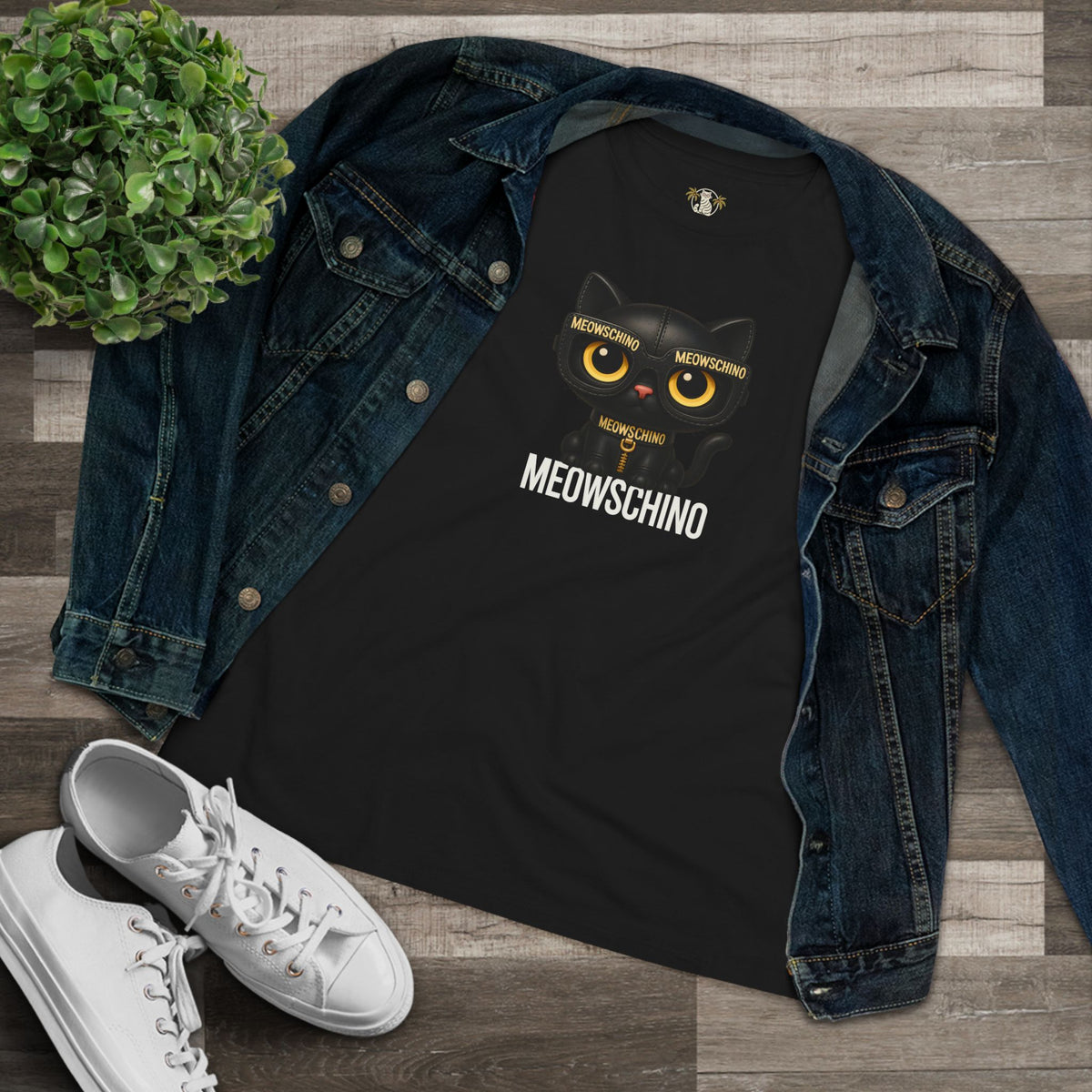 Meowschino Black Leather Cat Graphic Women's T-Shirt in black, flat lay